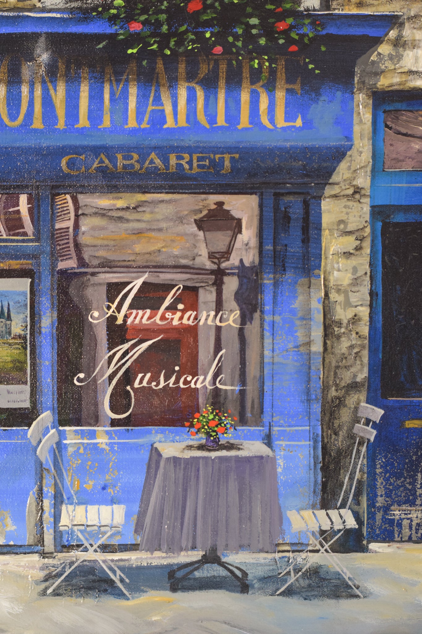 A painting of a restaurant with a table and chairs.