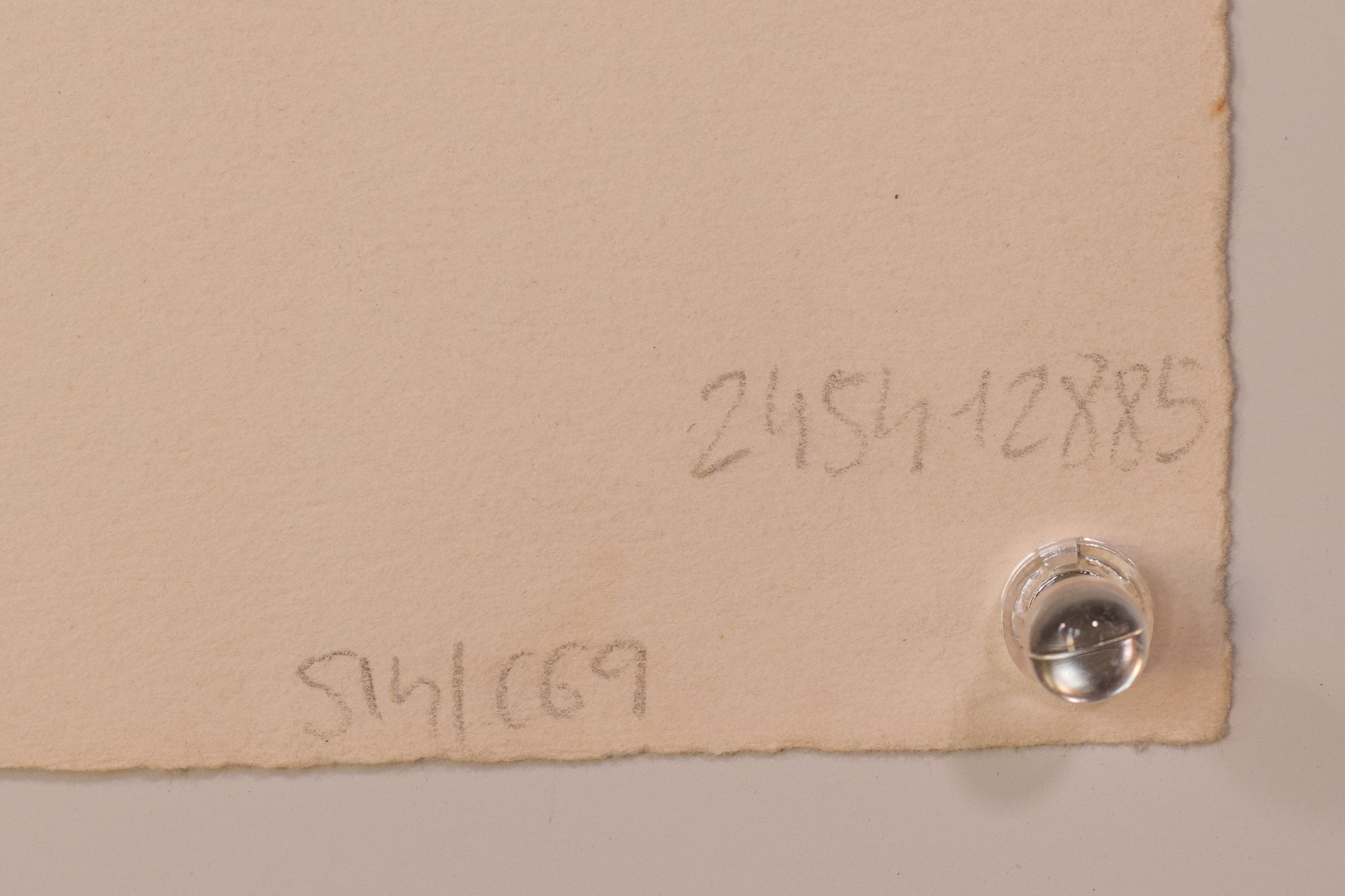 A drawing of a little girl in a red dress and hat.