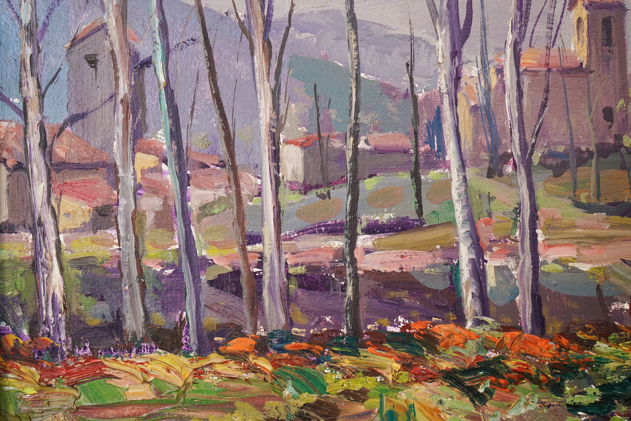 A painting of a landscape with trees and a church in the background.