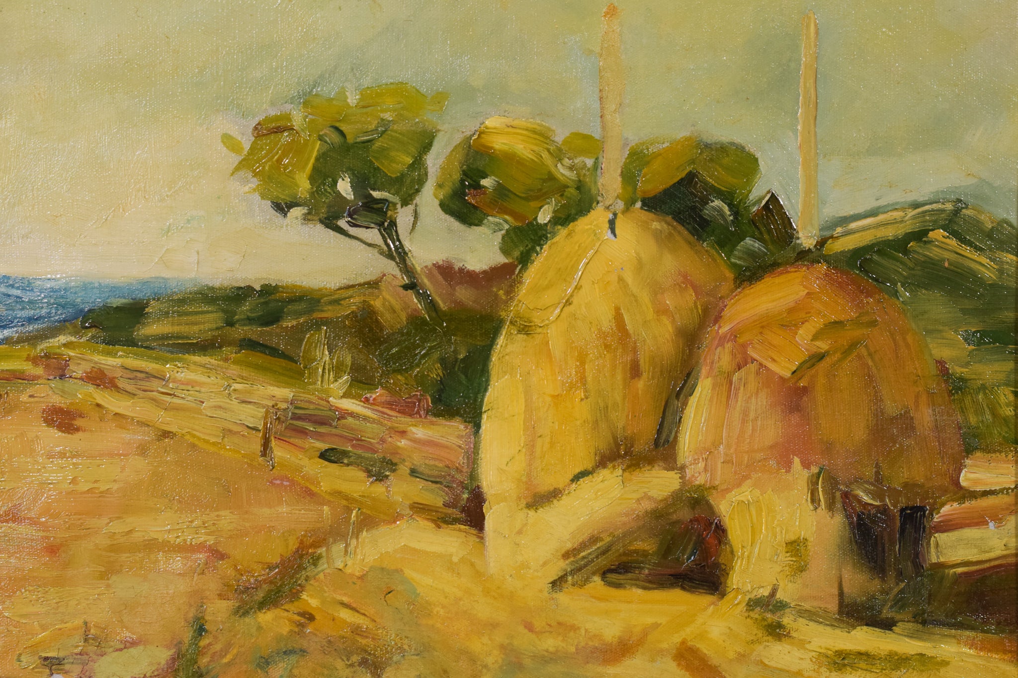 A painting of hay bales in a field with a tree in the background.