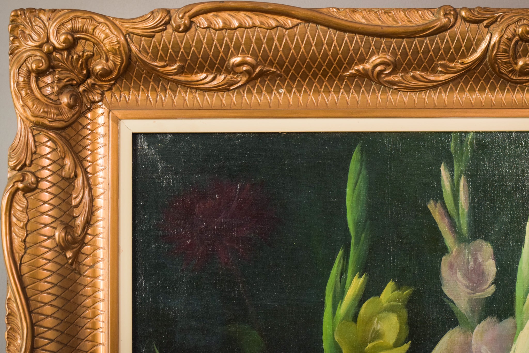 A painting of a bouquet of flowers on a green background.