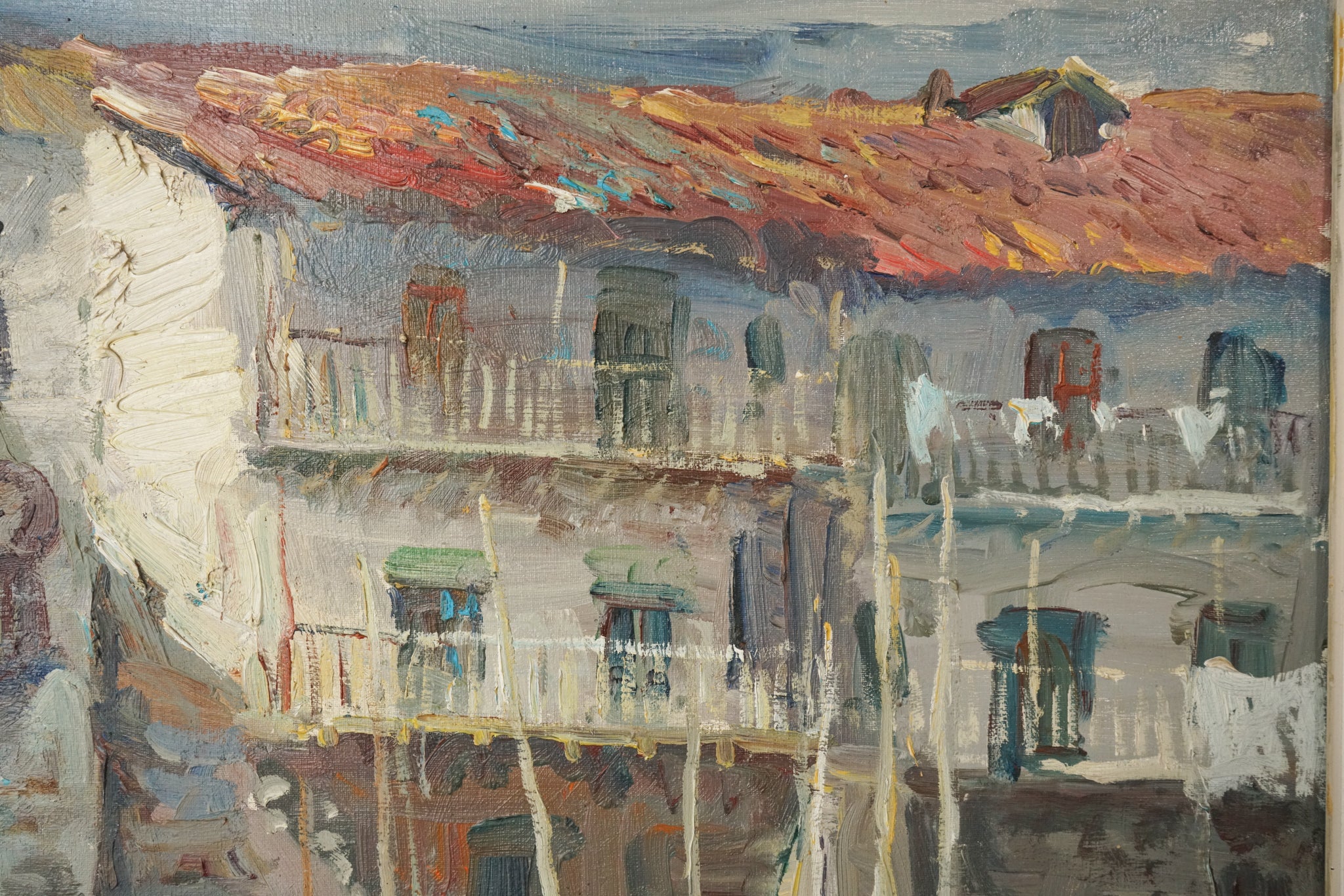 A painting of boats docked in a harbor next to buildings.