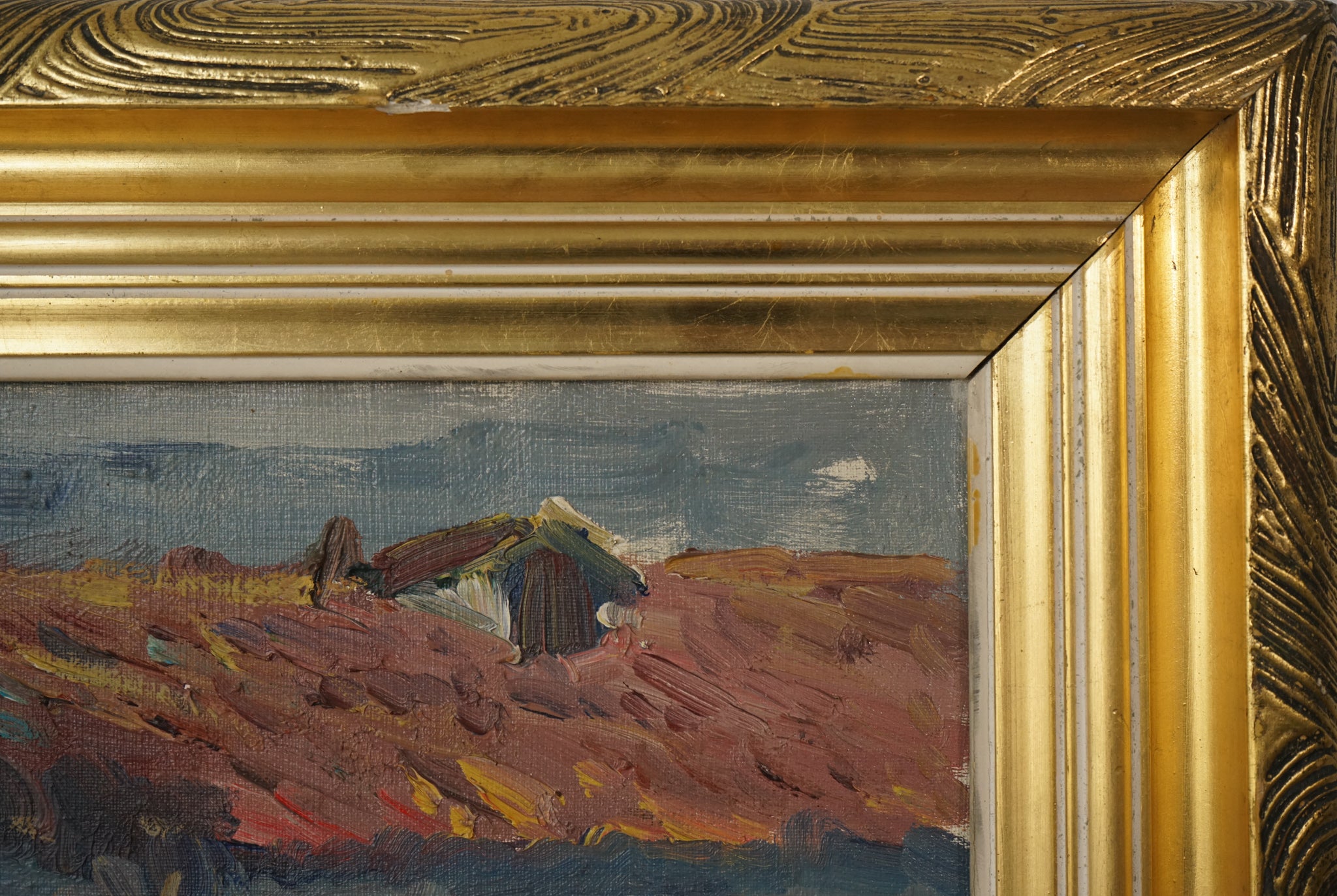 A painting of boats docked in a harbor next to buildings.