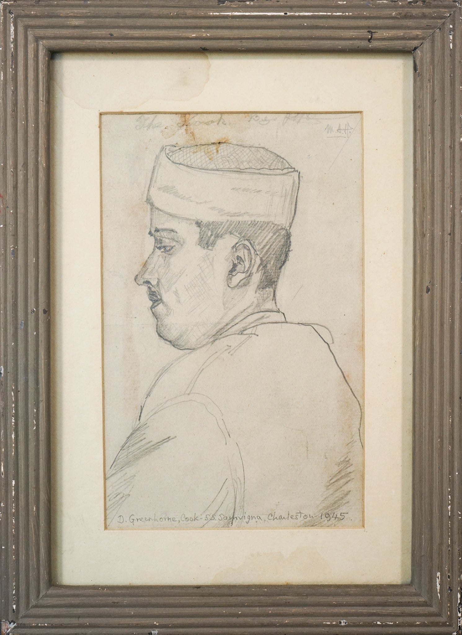 A drawing of a man wearing a hat. 