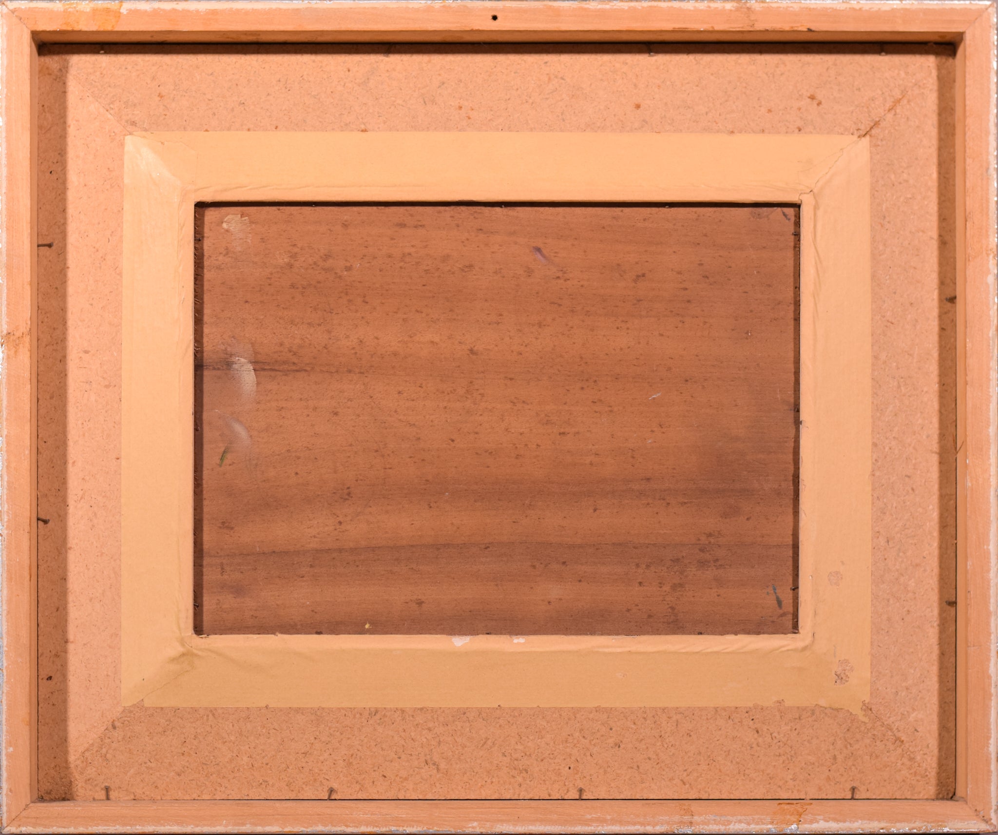 A painting of three onions on a green surface.