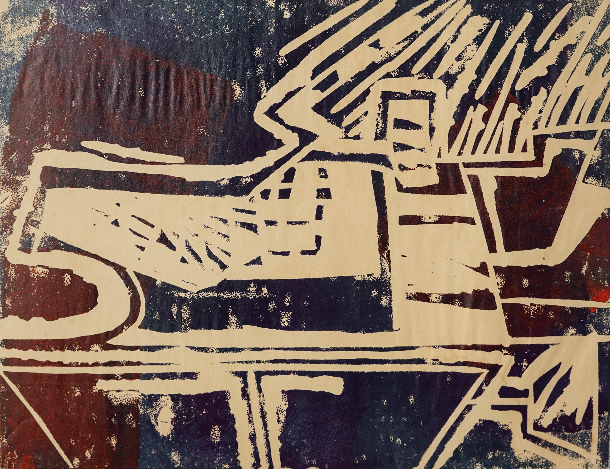 A painting of a green and red design on a black background.