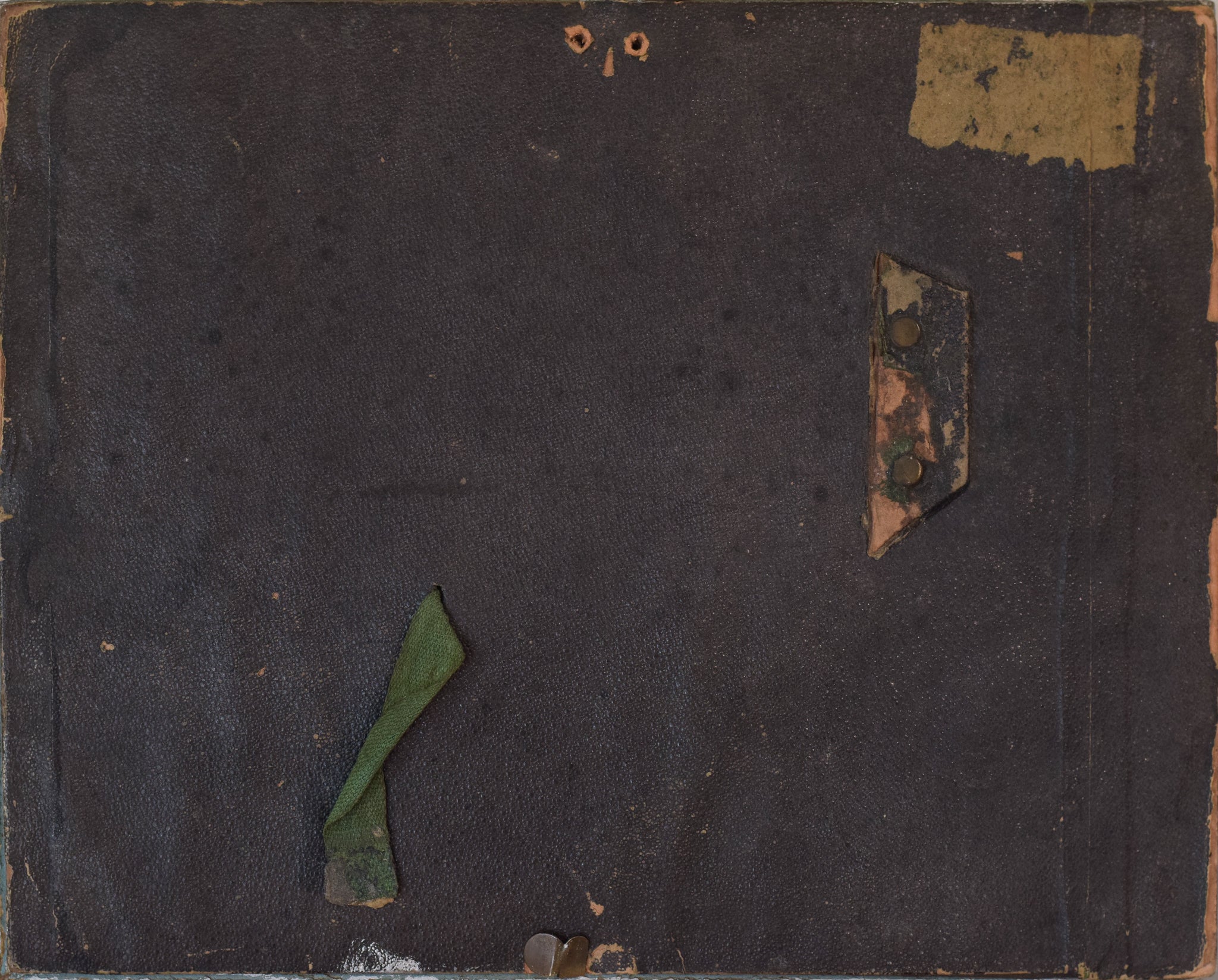 A black and white drawing of a group of people sitting on the ground.