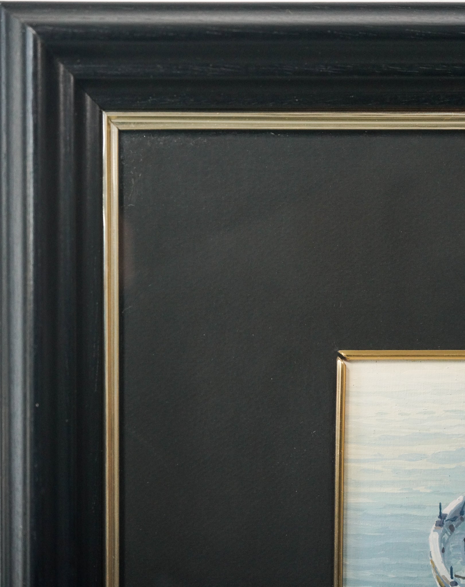 Two paintings of boats tied up to a dock.