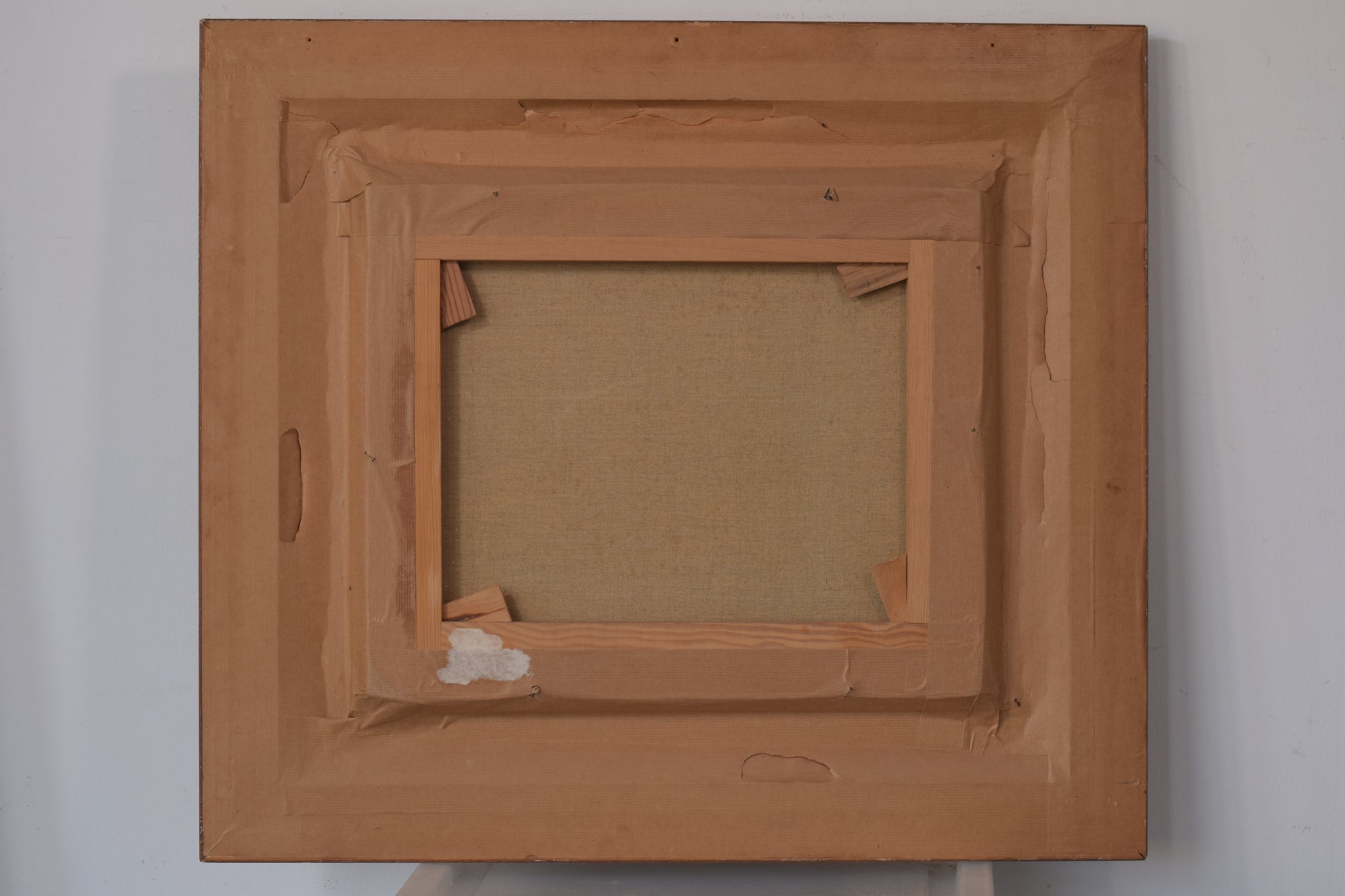 A painting of a park with trees and buildings in the background.