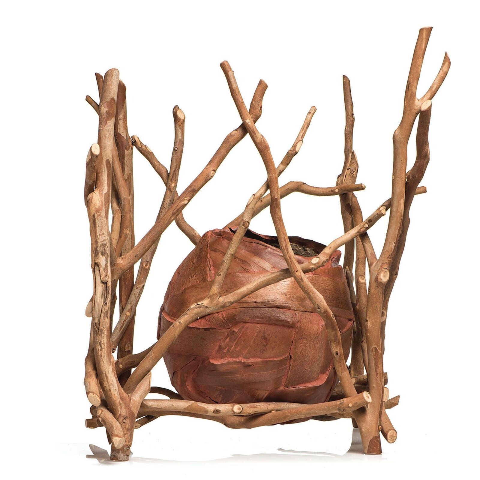 A sculpture of a vase sitting on top of a white table.