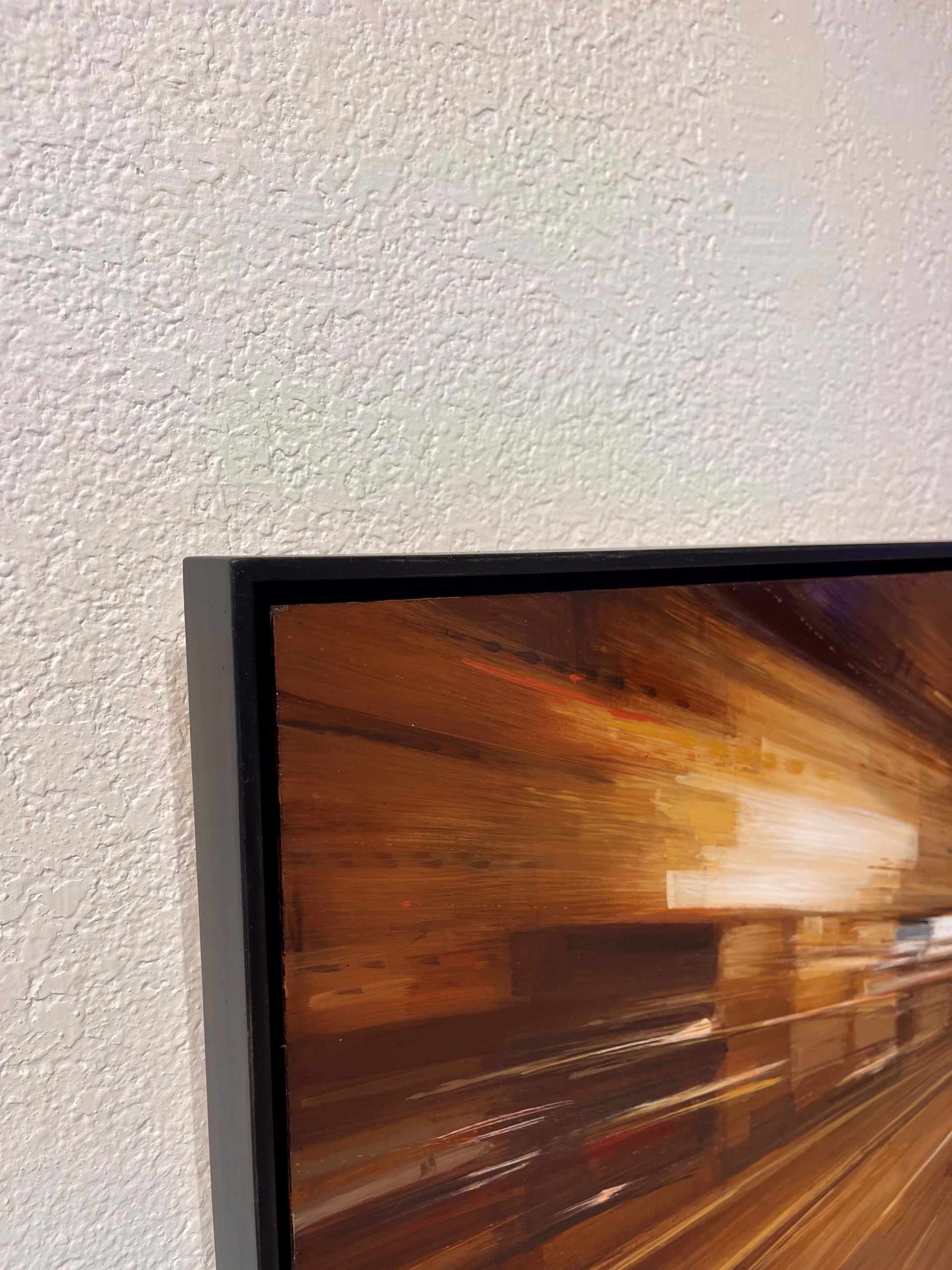 A blurry image of a city street at night.