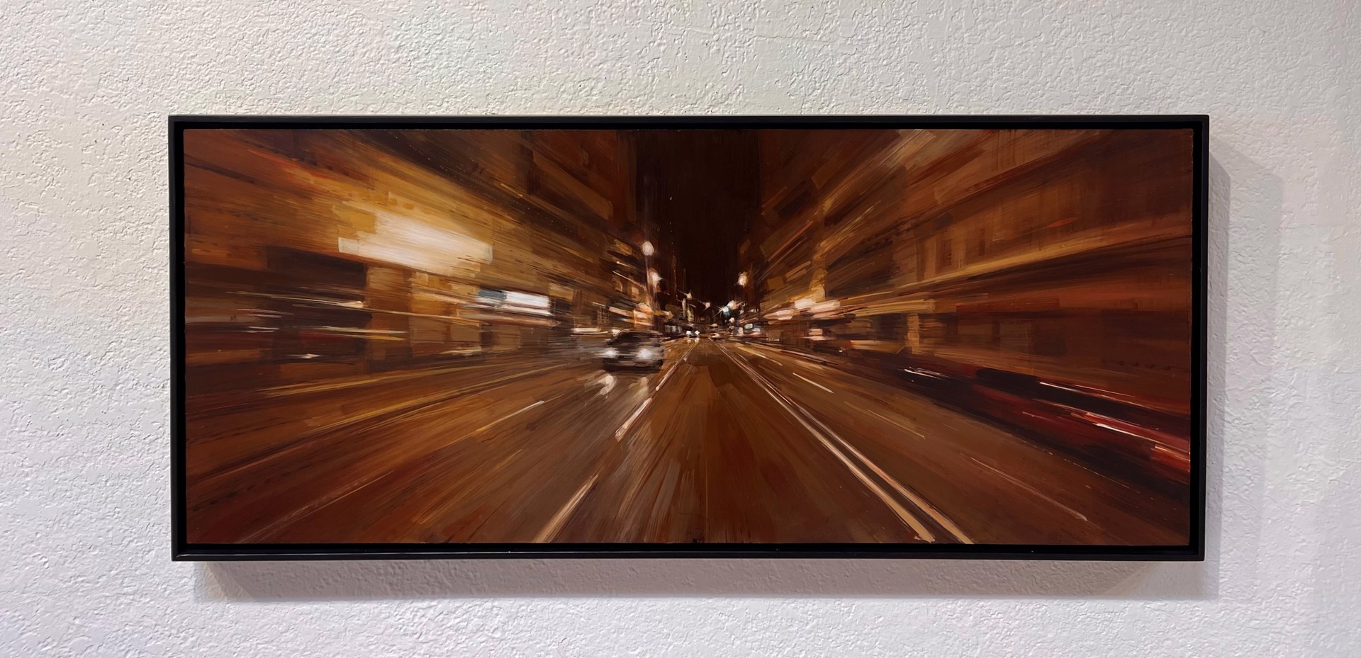 A blurry image of a city street at night.