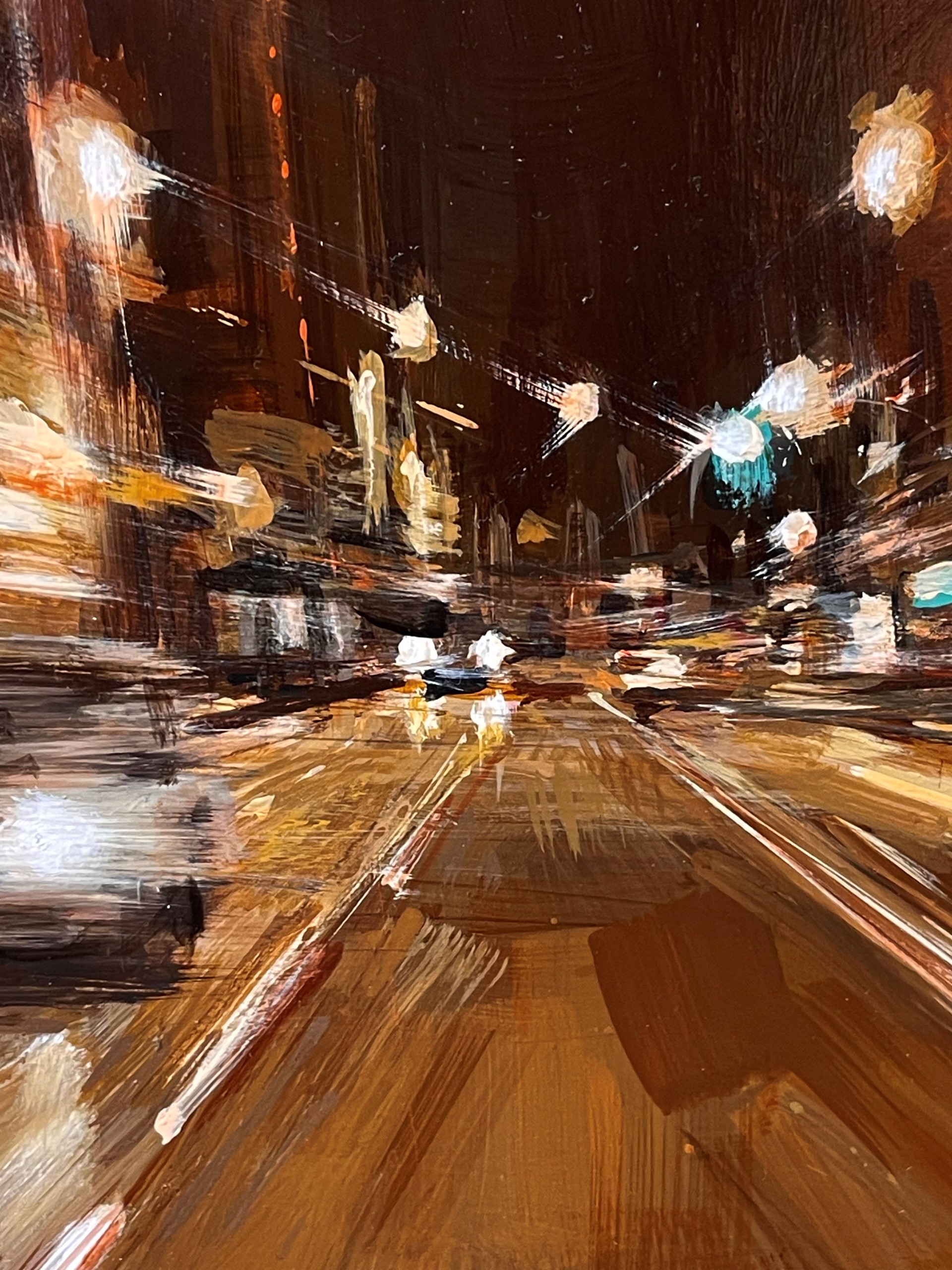 A blurry image of a city street at night.