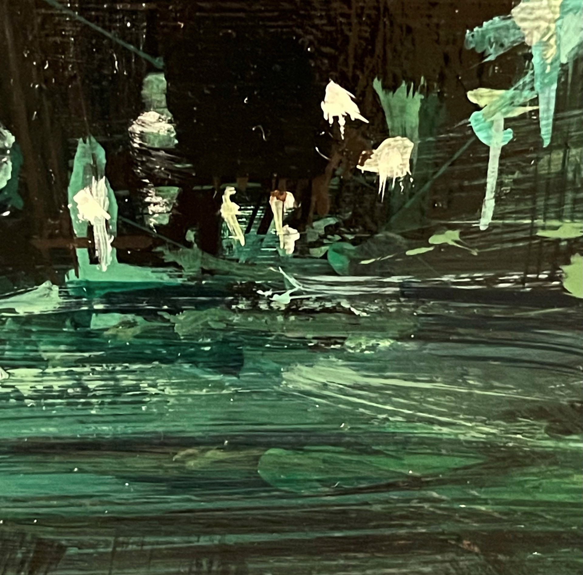 A first-person perspective of a rapid journey through a dark, green-lit urban corridor.