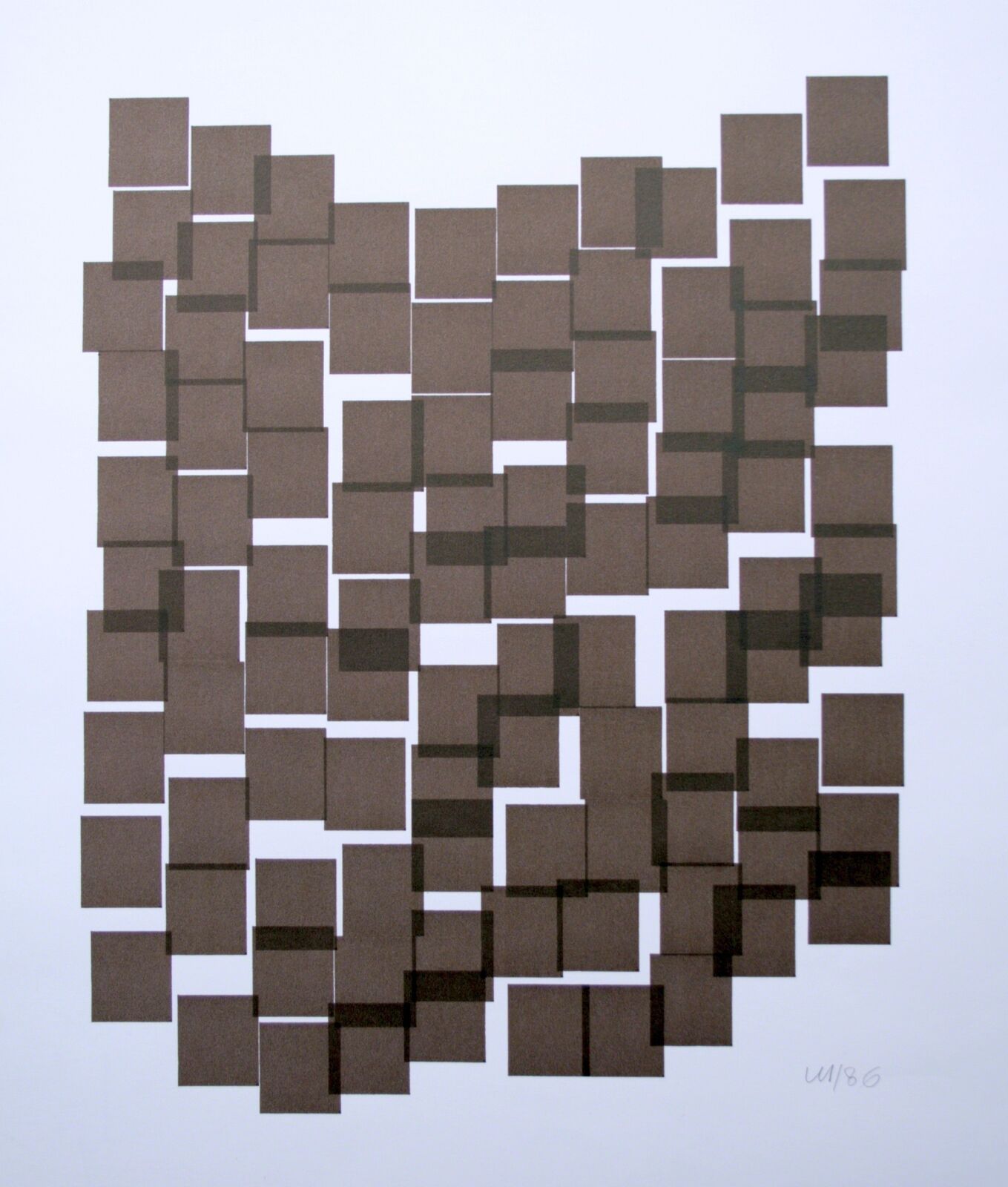 A piece of paper that has a pattern of squares on it.