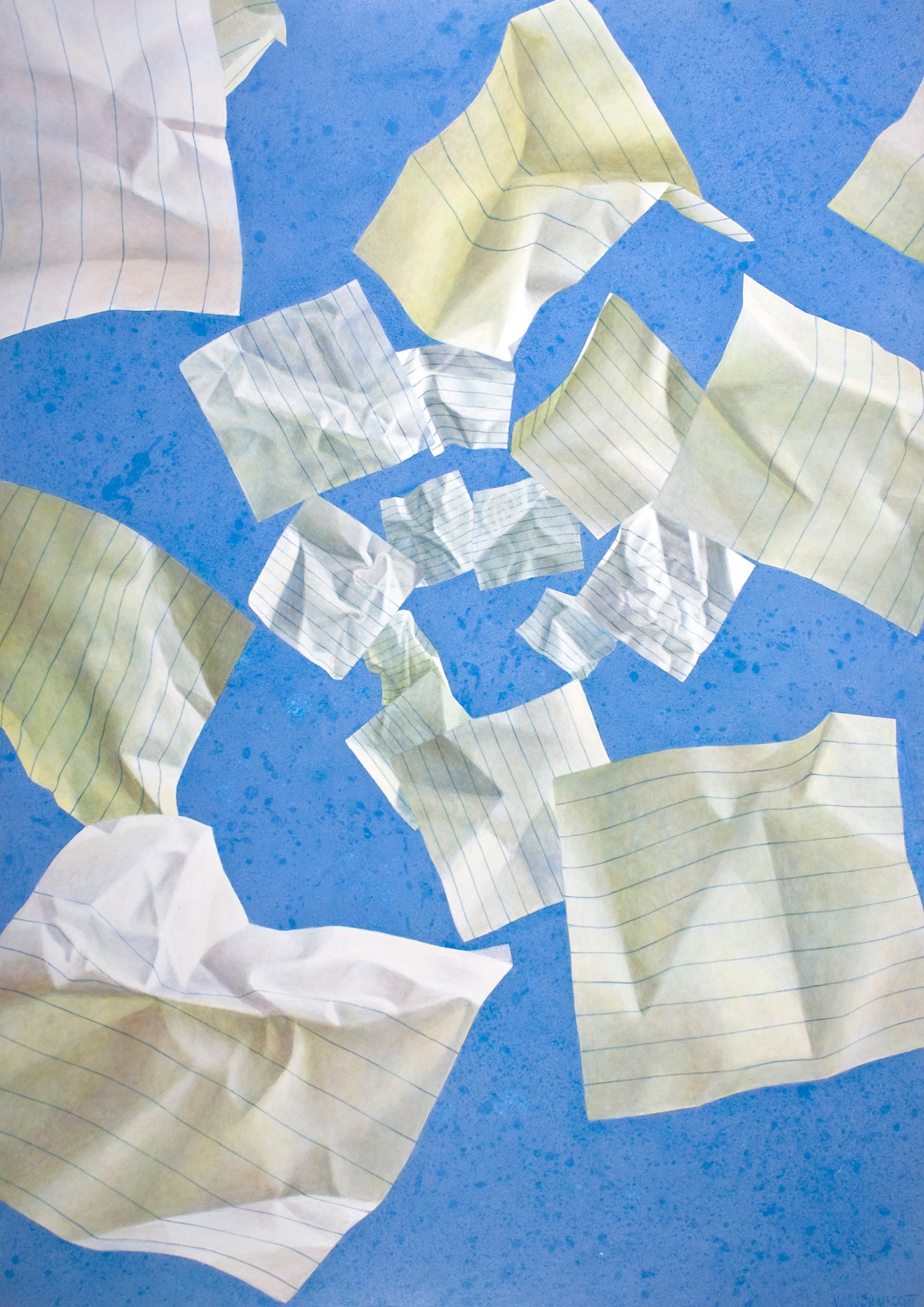 A bunch of pieces of paper scattered on a blue surface.