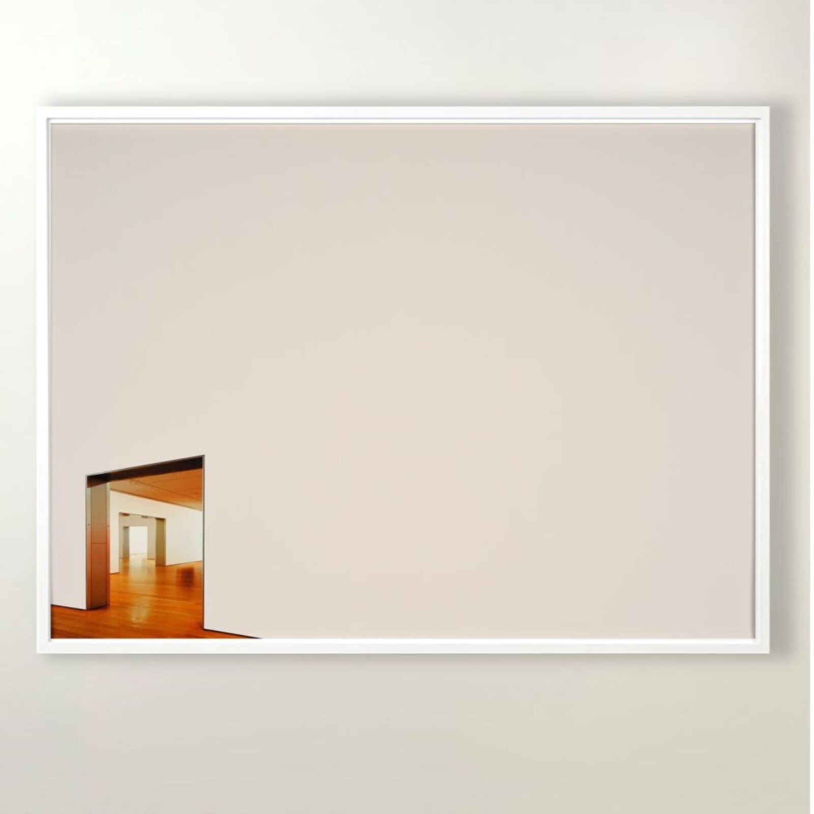 A minimalist framed photograph featuring a stark white wall with a small, colorful opening revealing an interior space.