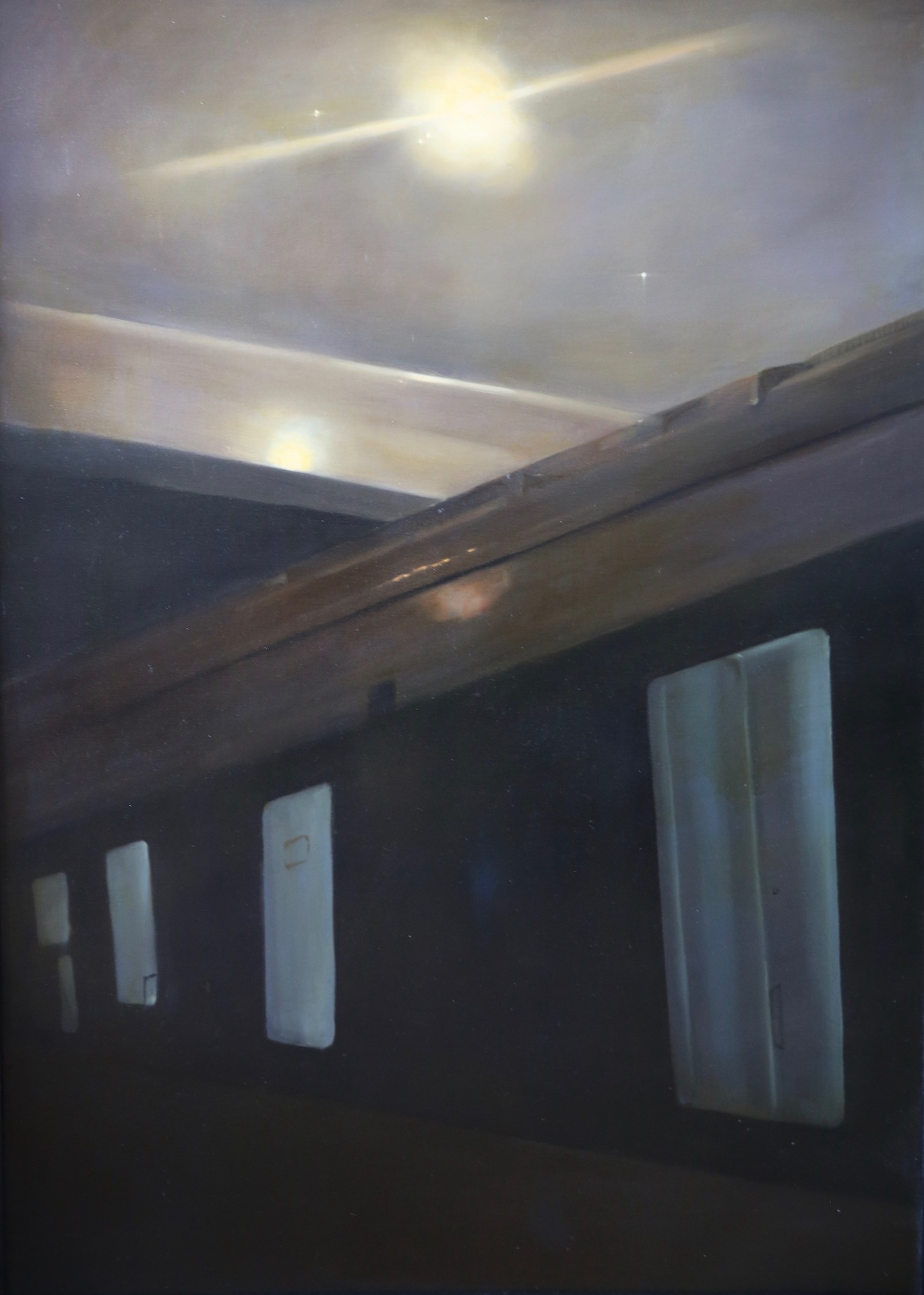 A dimly lit interior scene featuring a dark wall with four vertical rectangular shapes and a horizontal wooden beam.