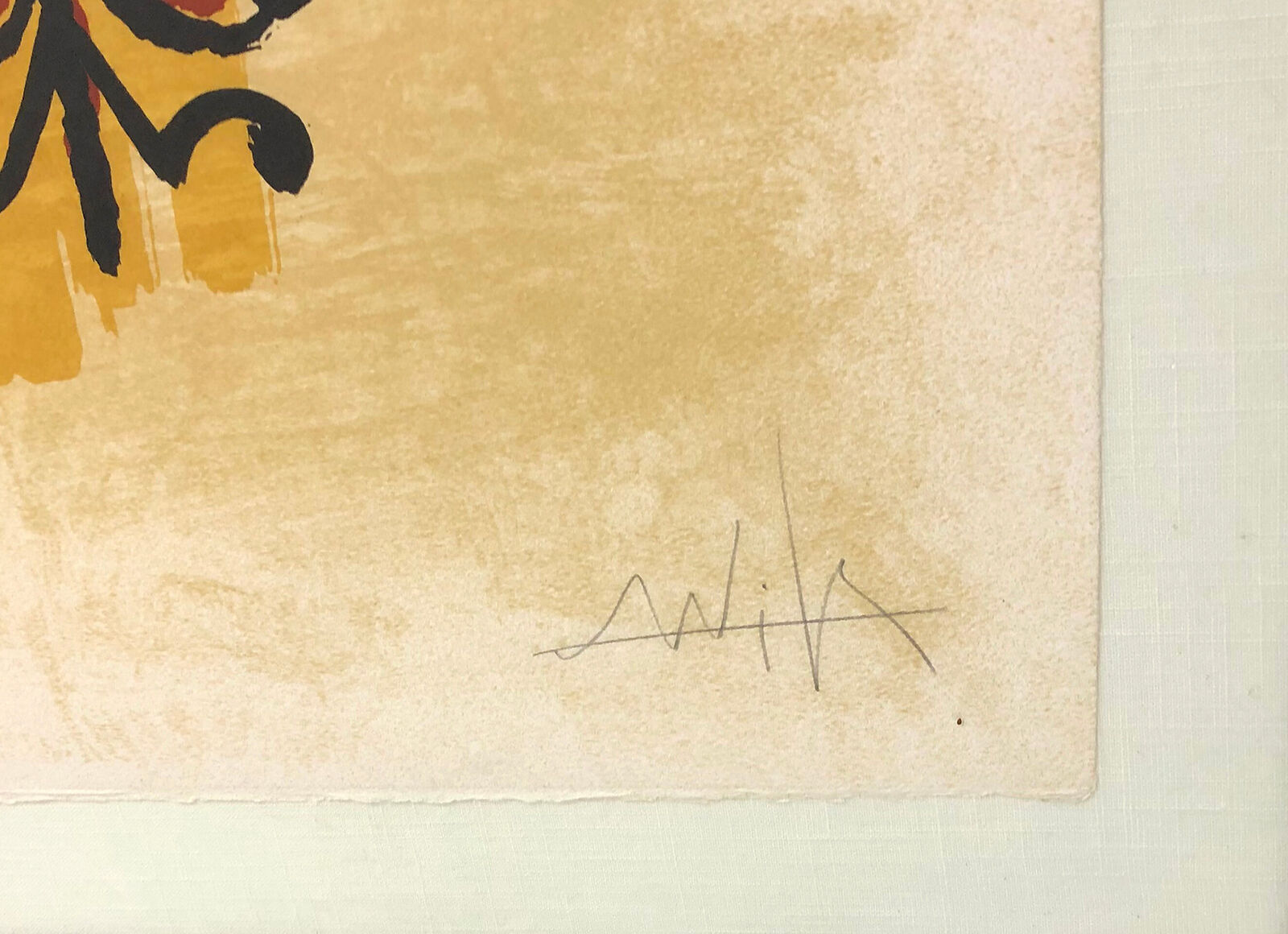 A painting of a man and a woman holding hands in a frame.