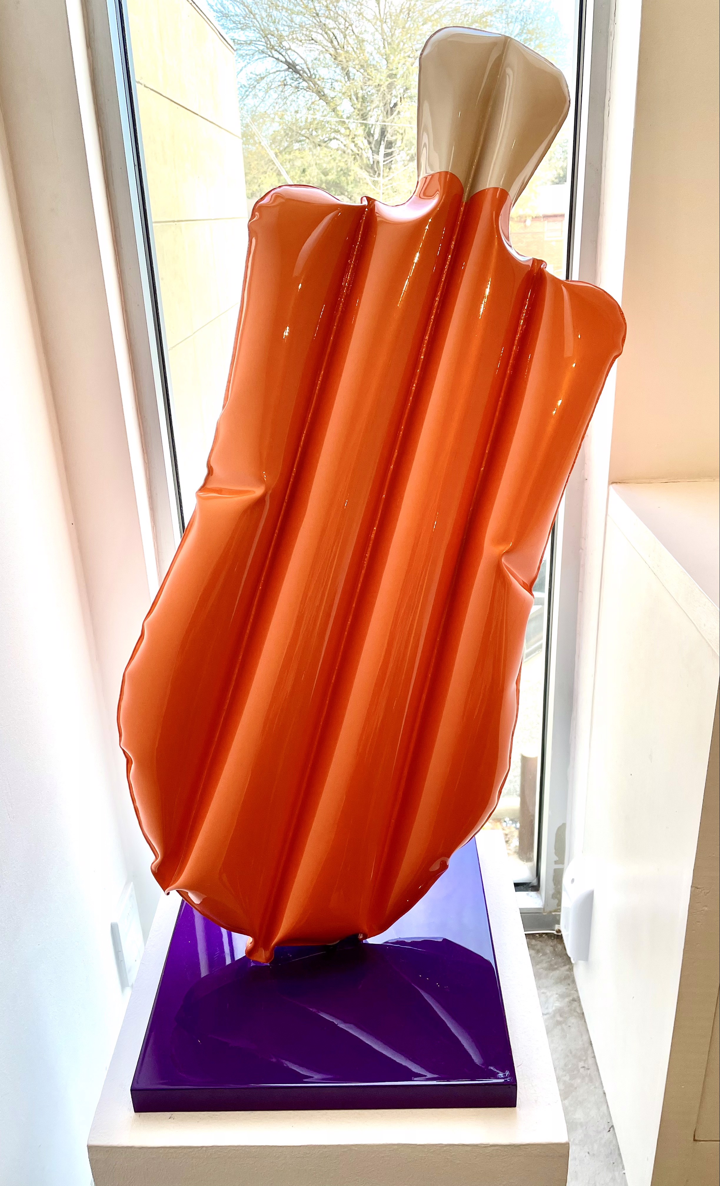Artwork by William Cannings, Dreamsicle, Made of Inflated steel, automotive paint, rubber valve, steel base 
