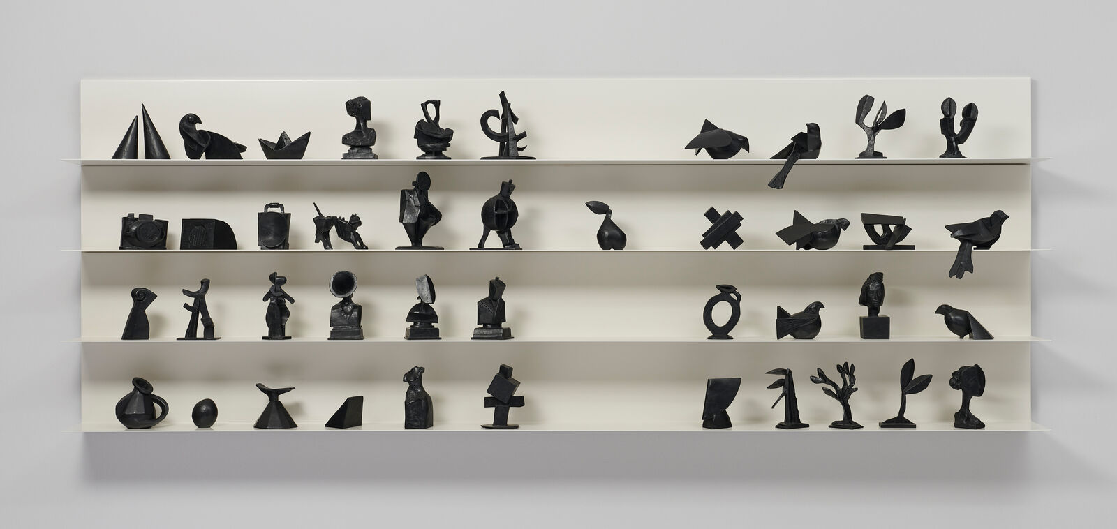 Artwork by William Kentridge, Italics Plus, Made of Set of 42 bronzes with custom steel shelves 