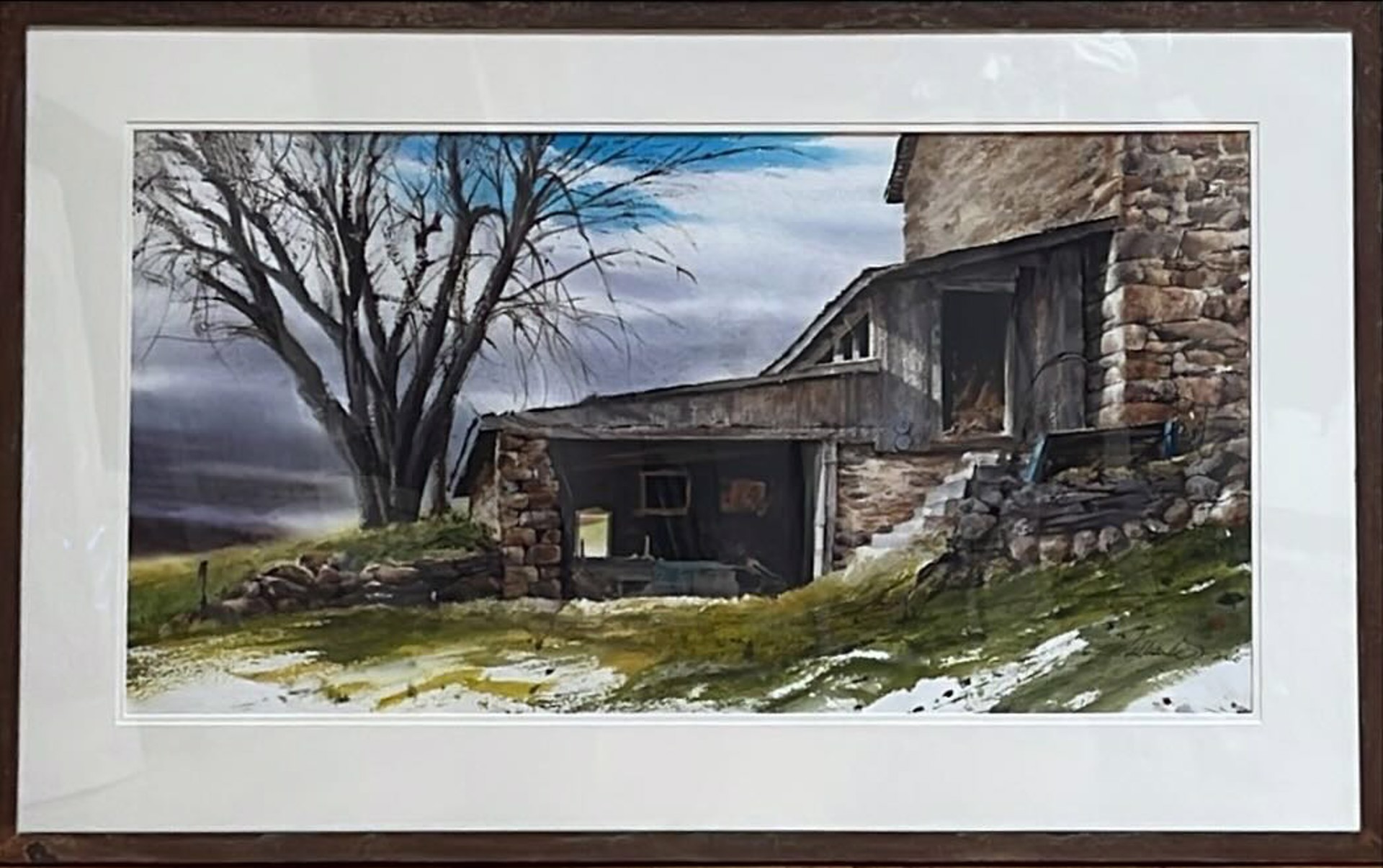 A watercolor painting of an old stone building with a tree in the background.