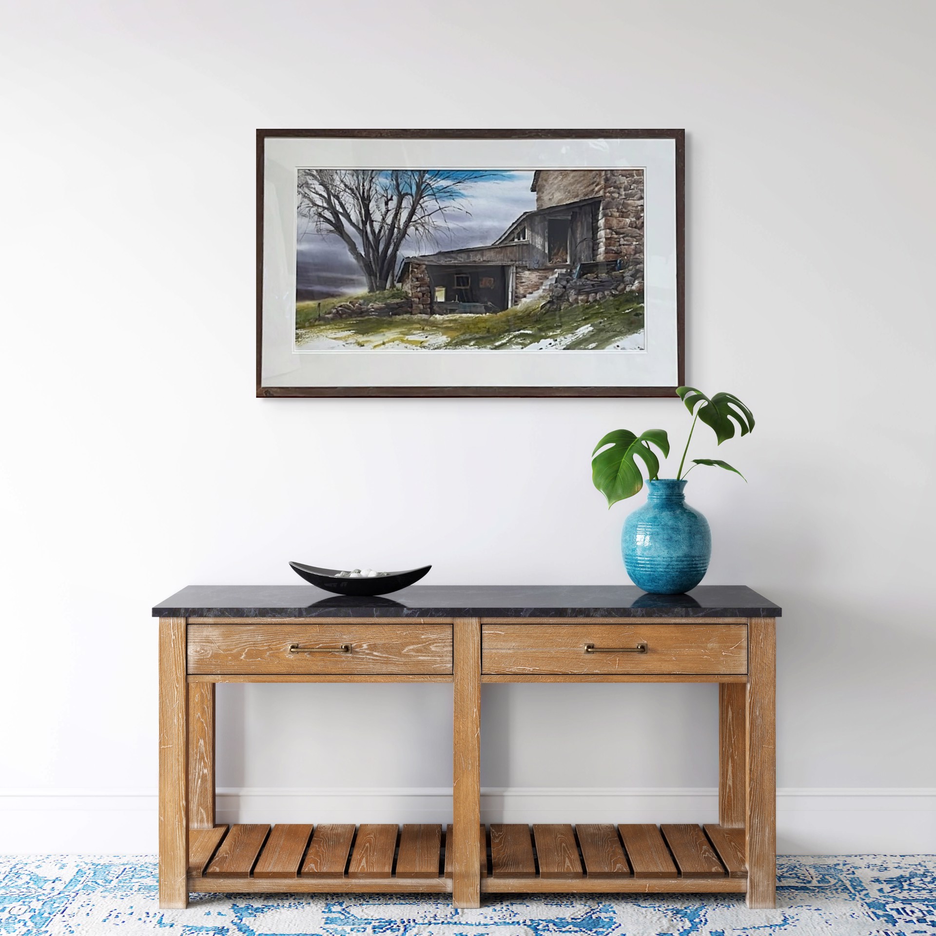 A watercolor painting of an old stone building with a tree in the background.