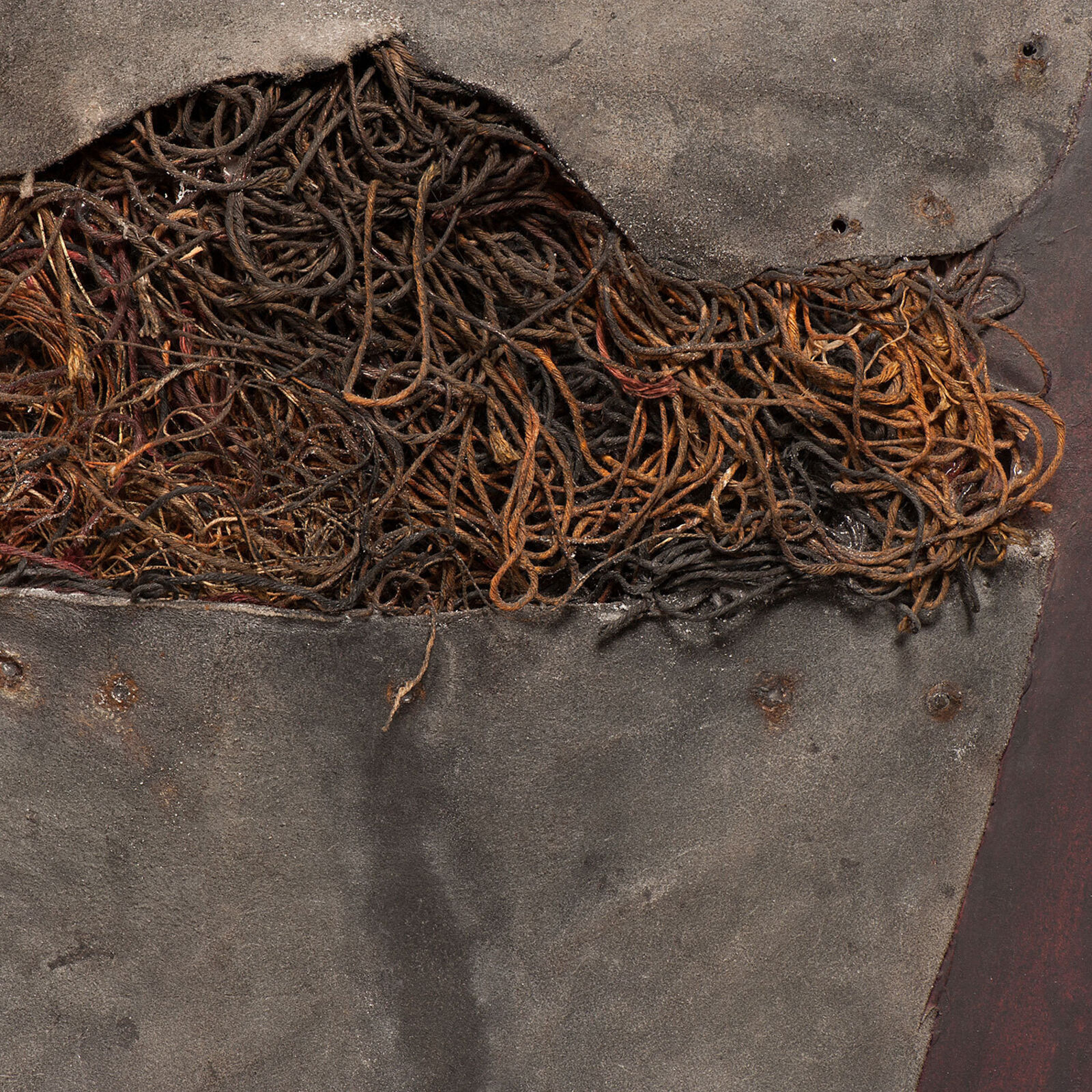 A painting hanging on a wall in a room.