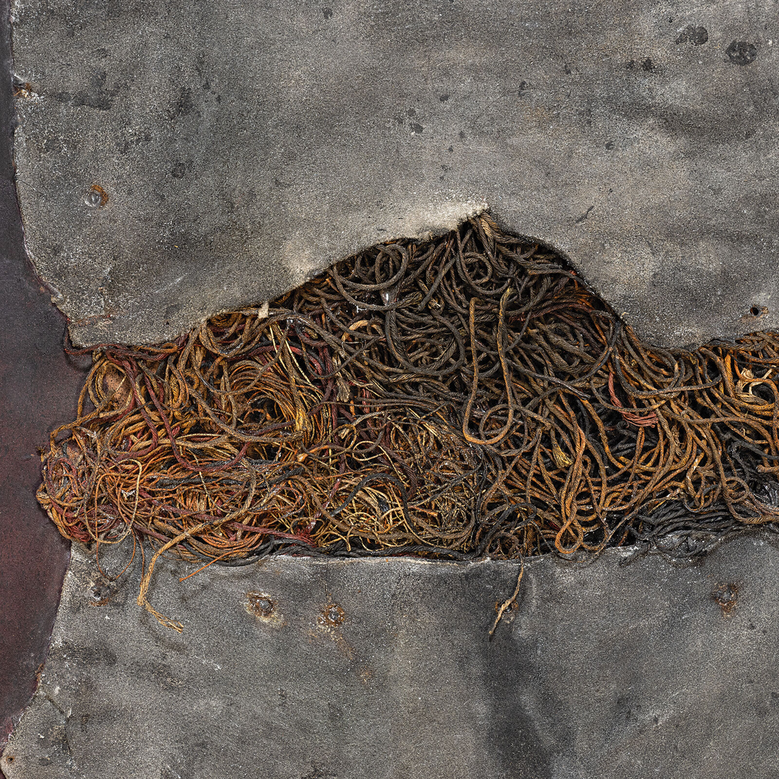 A painting hanging on a wall in a room.