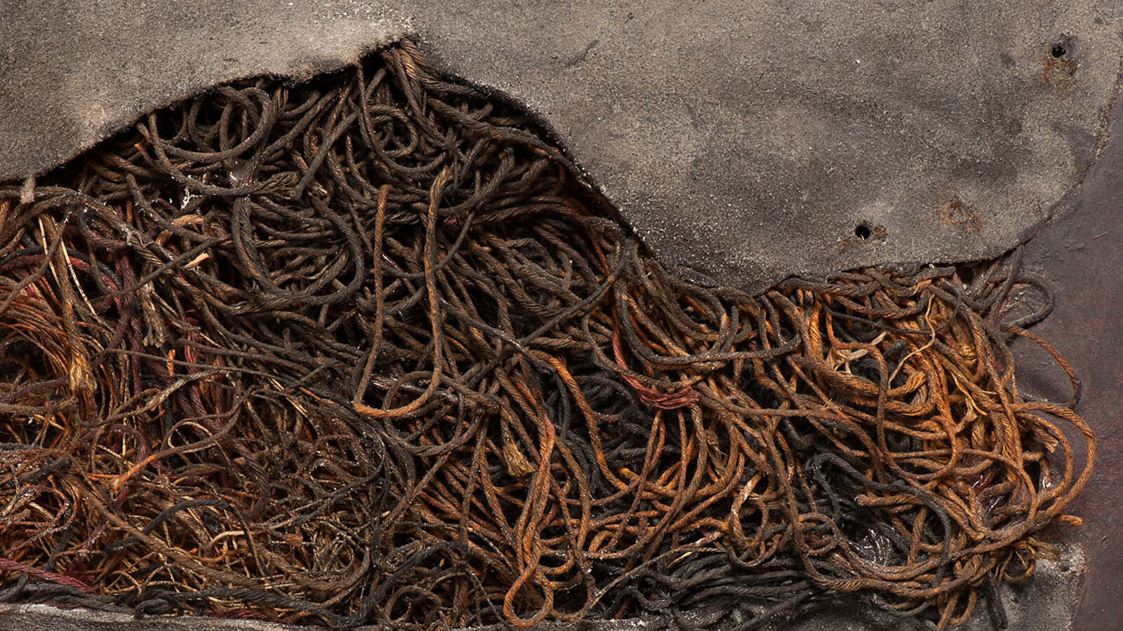 A painting hanging on a wall in a room.