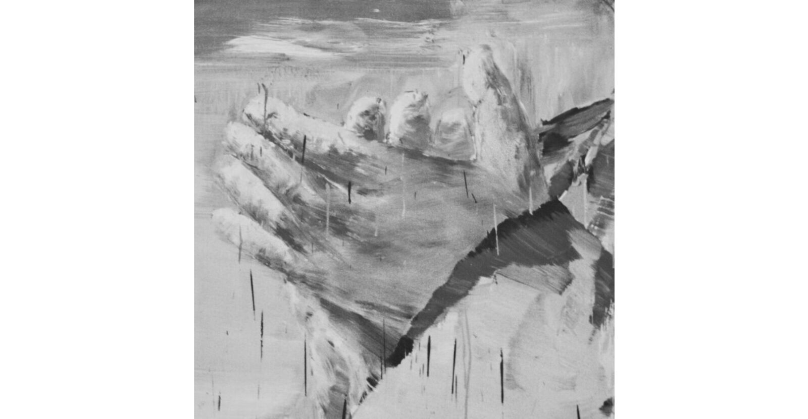 A set of four black and white photographs of a man in a suit.