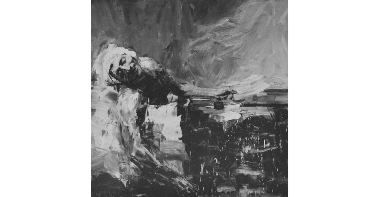 A set of four black and white photographs of a man in a suit.