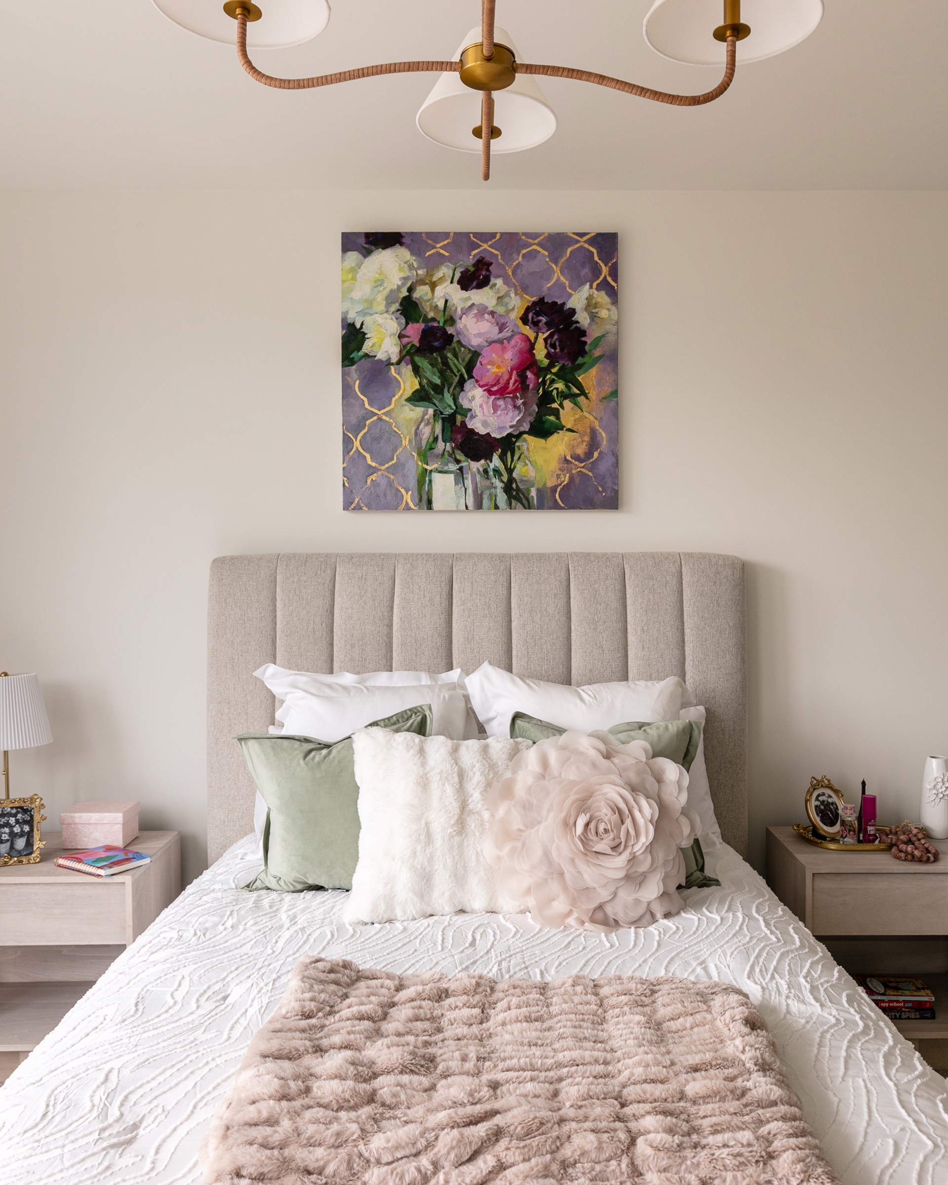 A painting of flowers in a vase on a table.