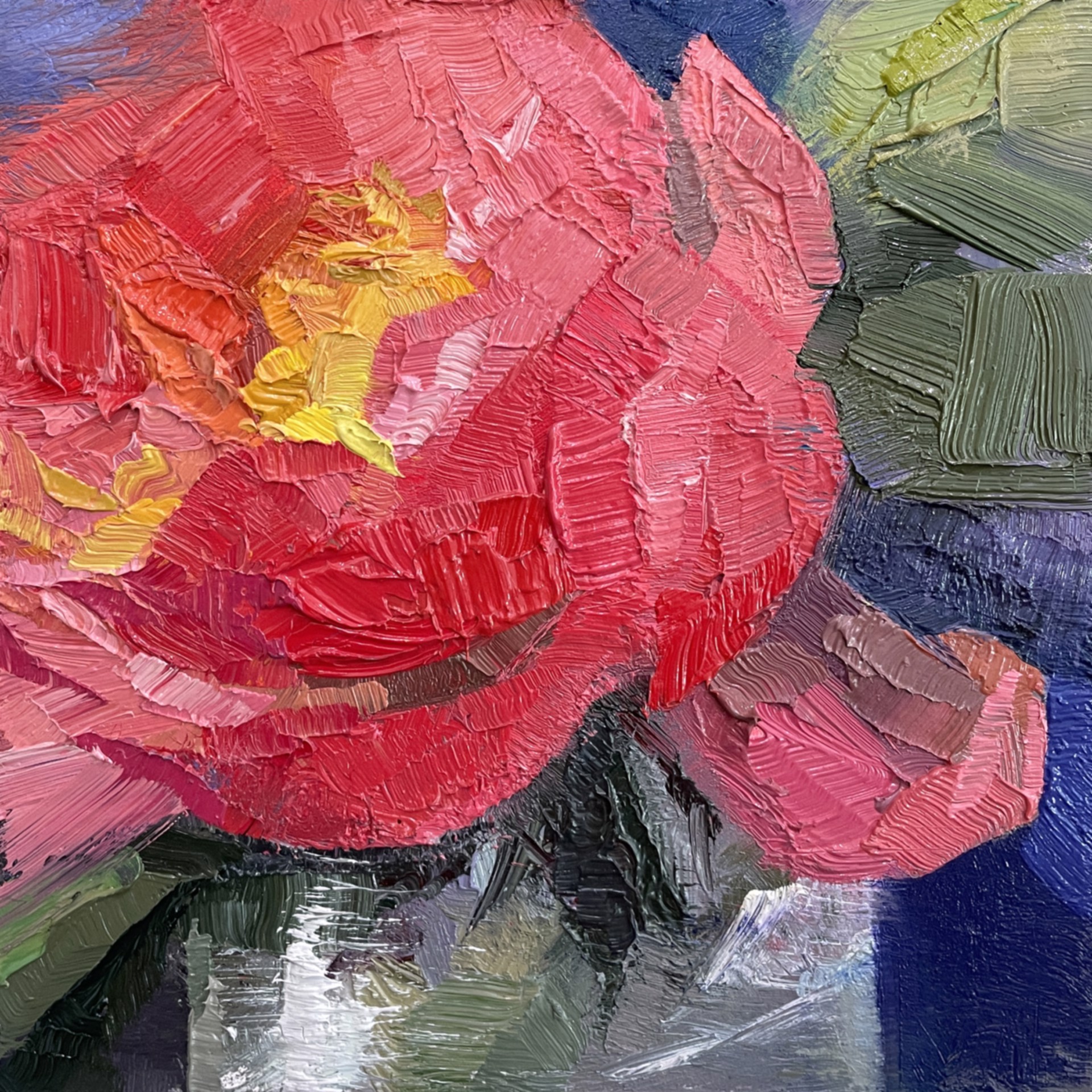 A painting of a red flower on a blue background.