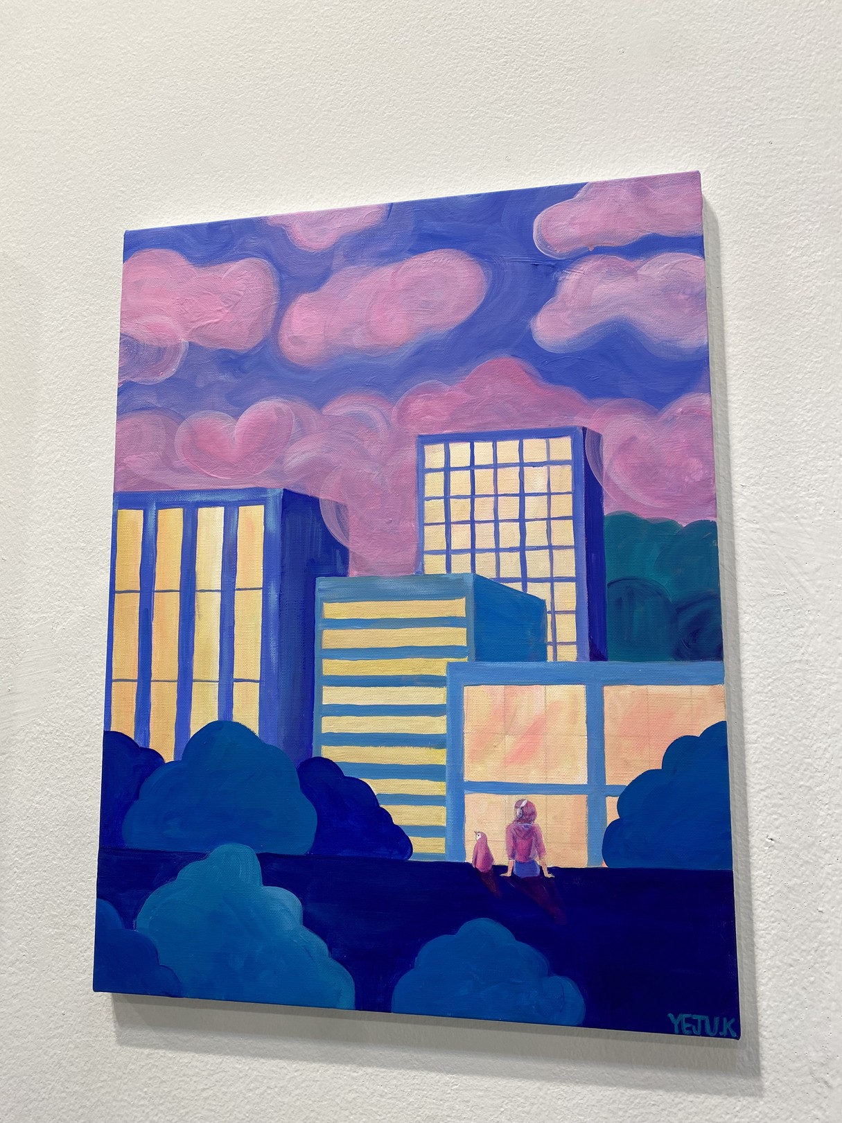 A stylized cityscape painting featuring a figure and cat against glowing buildings under a pink sky.