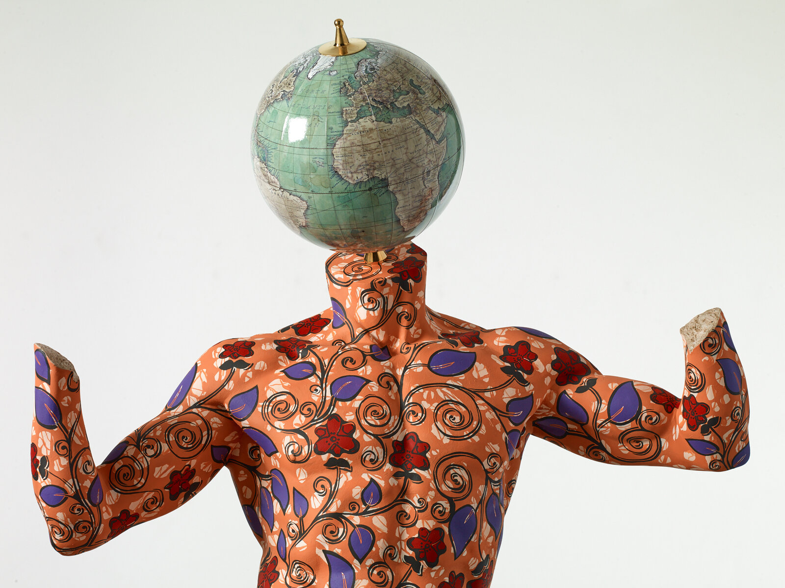 Artwork by Yinka Shonibare, Diadumenos, Made of Fibreglass sculpture, hand-painted with Dutch wax pattern, bespoke hand-coloured globe, gold leaf and steel base plate 