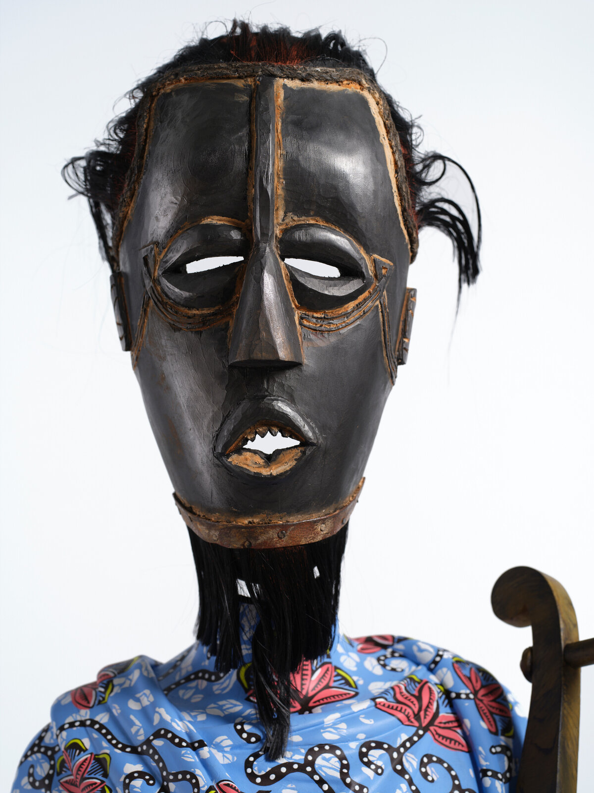 Artwork by Yinka Shonibare, Hybrid Sculpture (Terpsichore / Bété-Guro Mask), Made of Fibreglass sculpture, hand-painted with Dutch wax pattern, hand-carved wooden mask and steel baseplate or plinth 