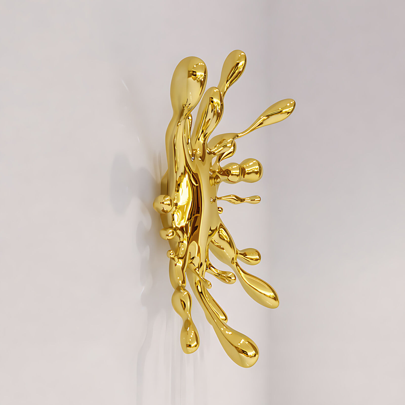 A gold splatter on a white wall. 