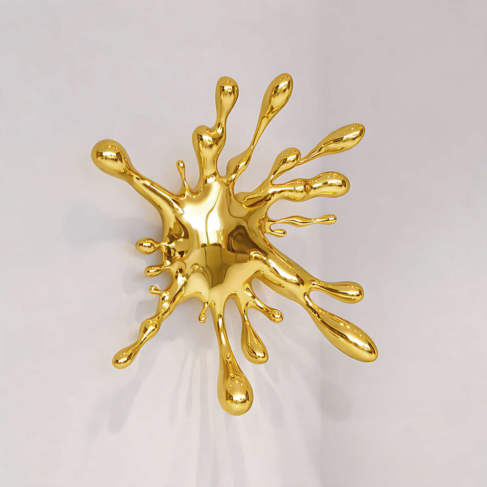 A gold splatter on a white wall. 