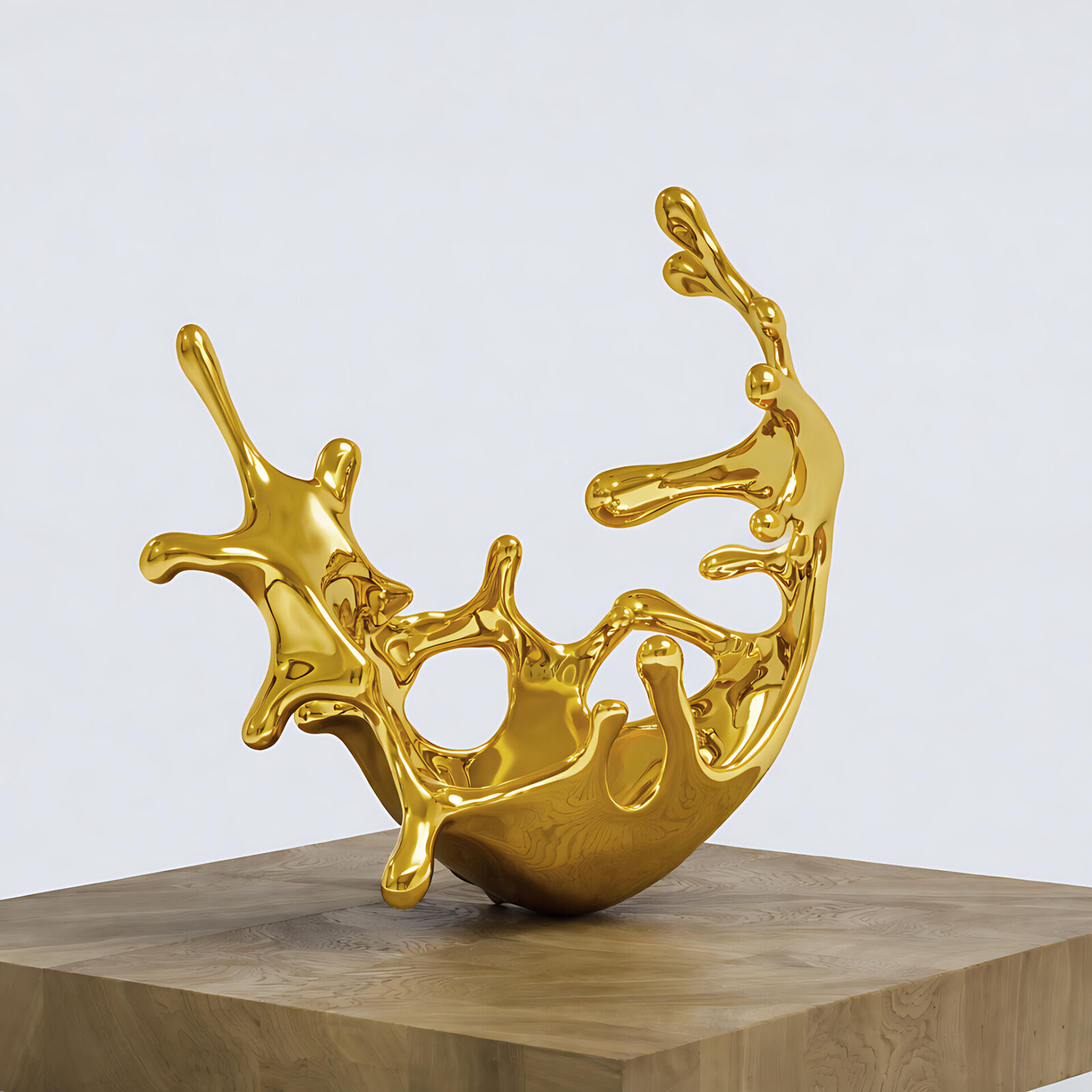 A gold sculpture on a wooden pedestal on a white background.
