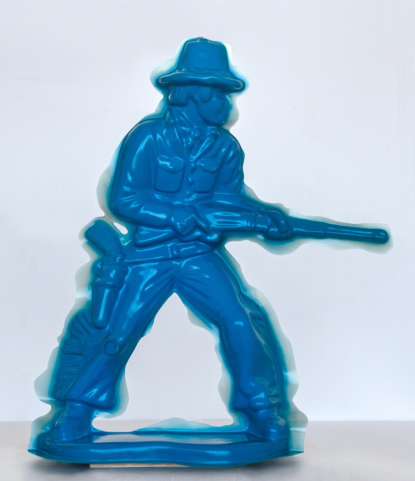 A translucent blue figure of a soldier holding a rifle.