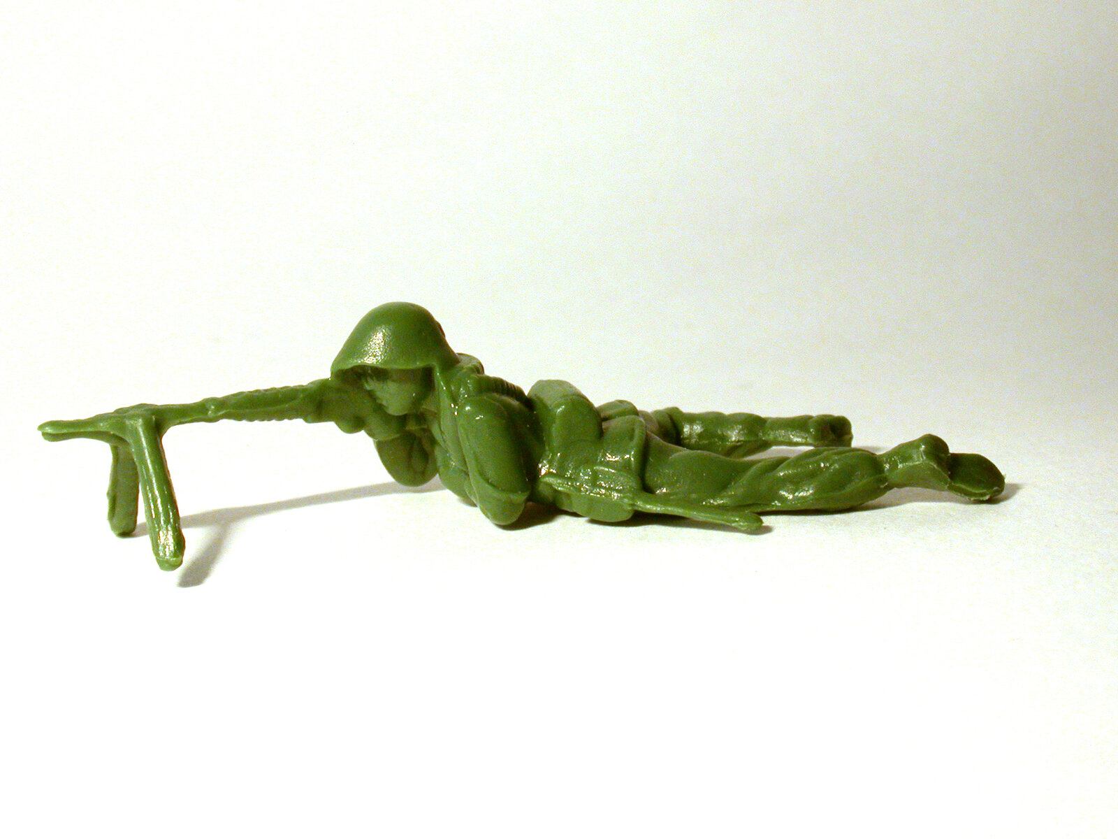 Artwork by Yoram Wolberger, Toy Soldier #5 (Prone Position), Made of Reinforced cast fiberglass composite and pigmented resin 