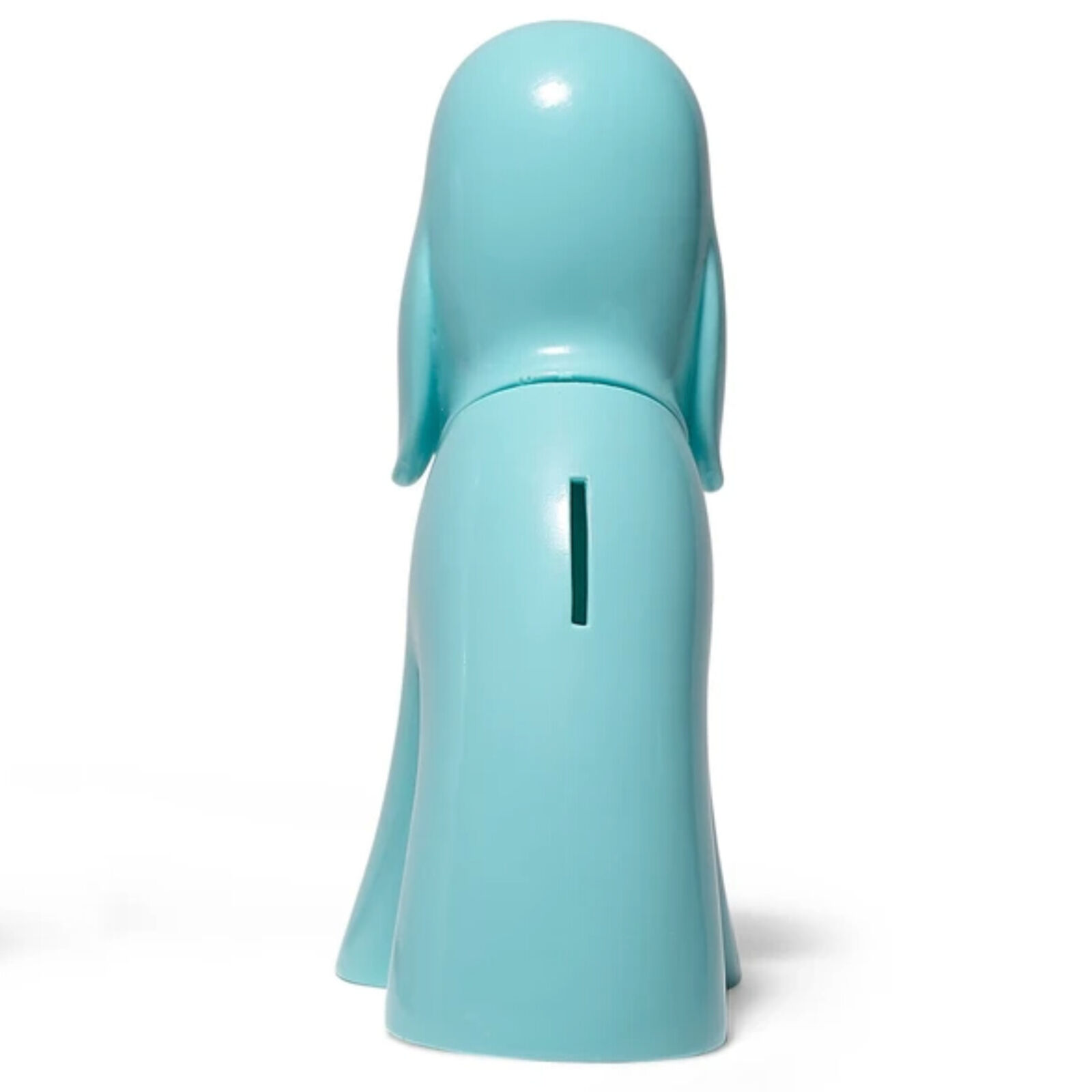 A blue dog figurine sitting on a white surface.