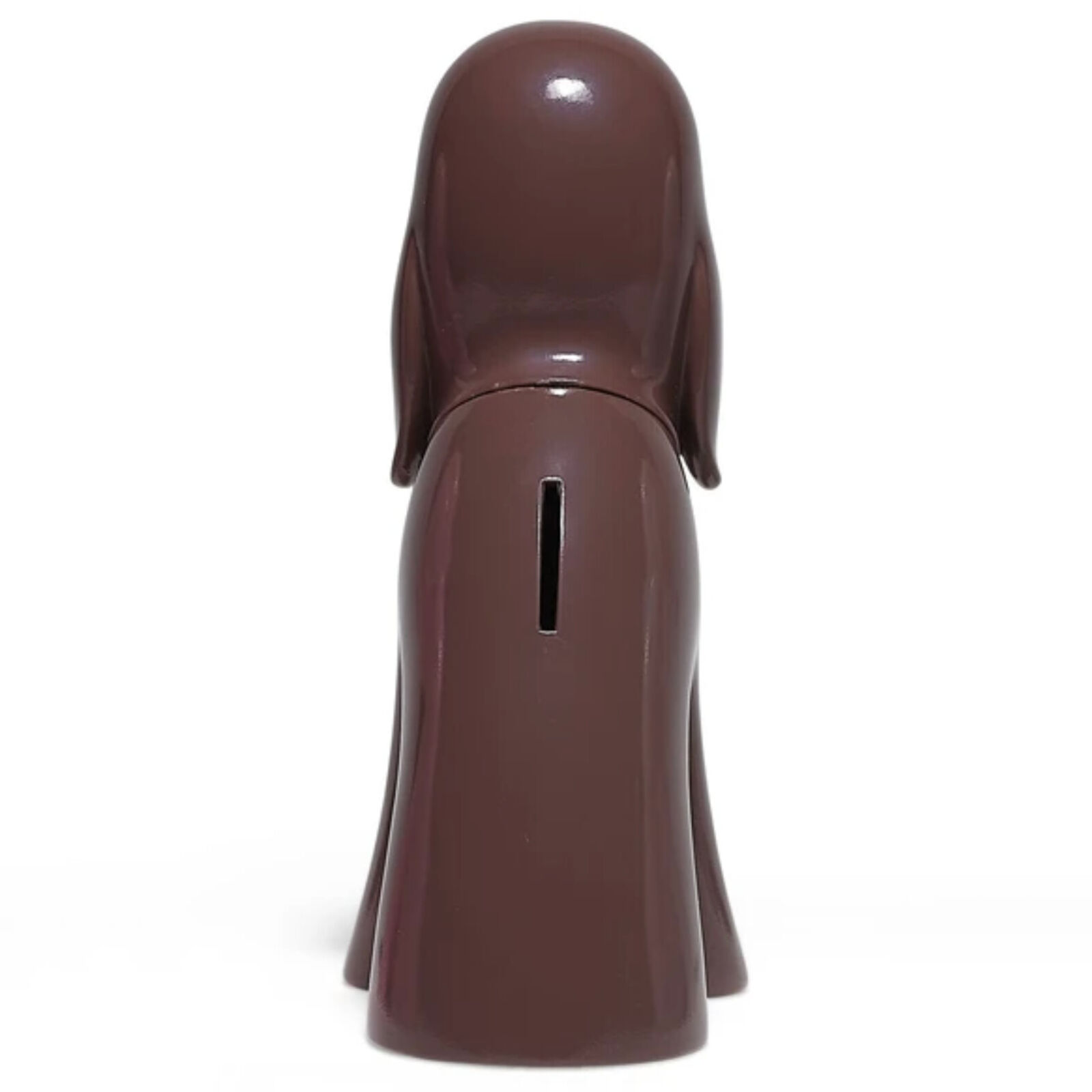 A brown dog figurine sitting on a white background.