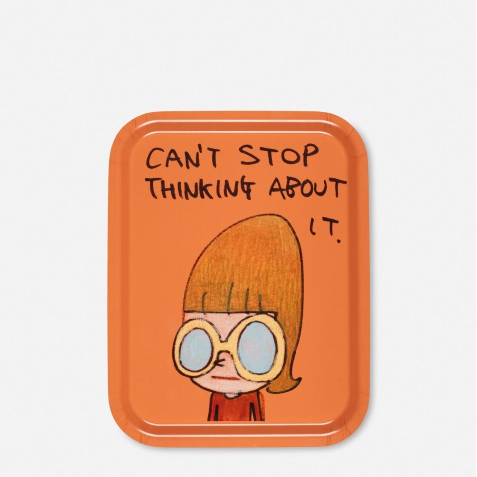 A small orange tray with a drawing of a girl wearing sunglasses.