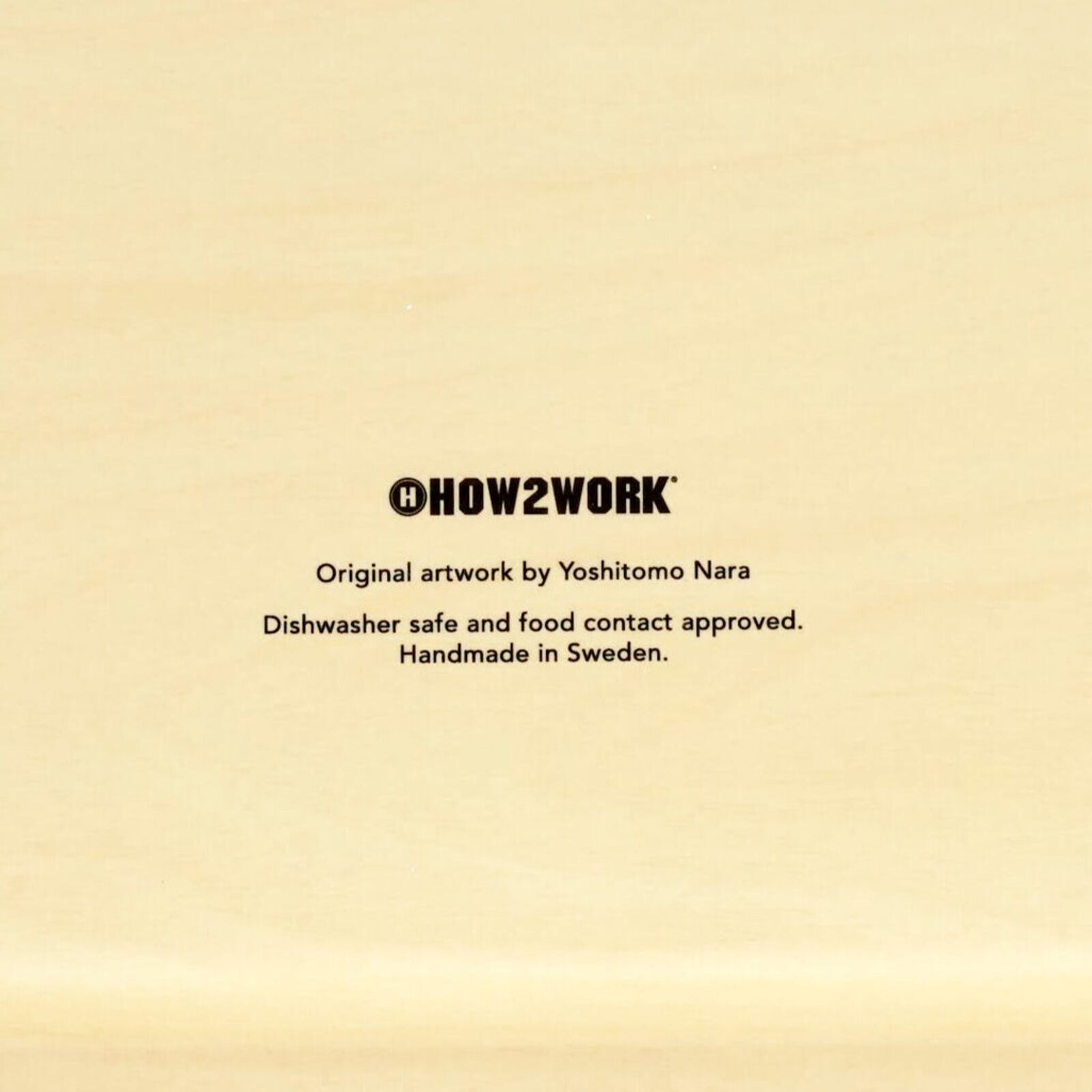 A rectangular tray with a drawing of a girl floating in the water.