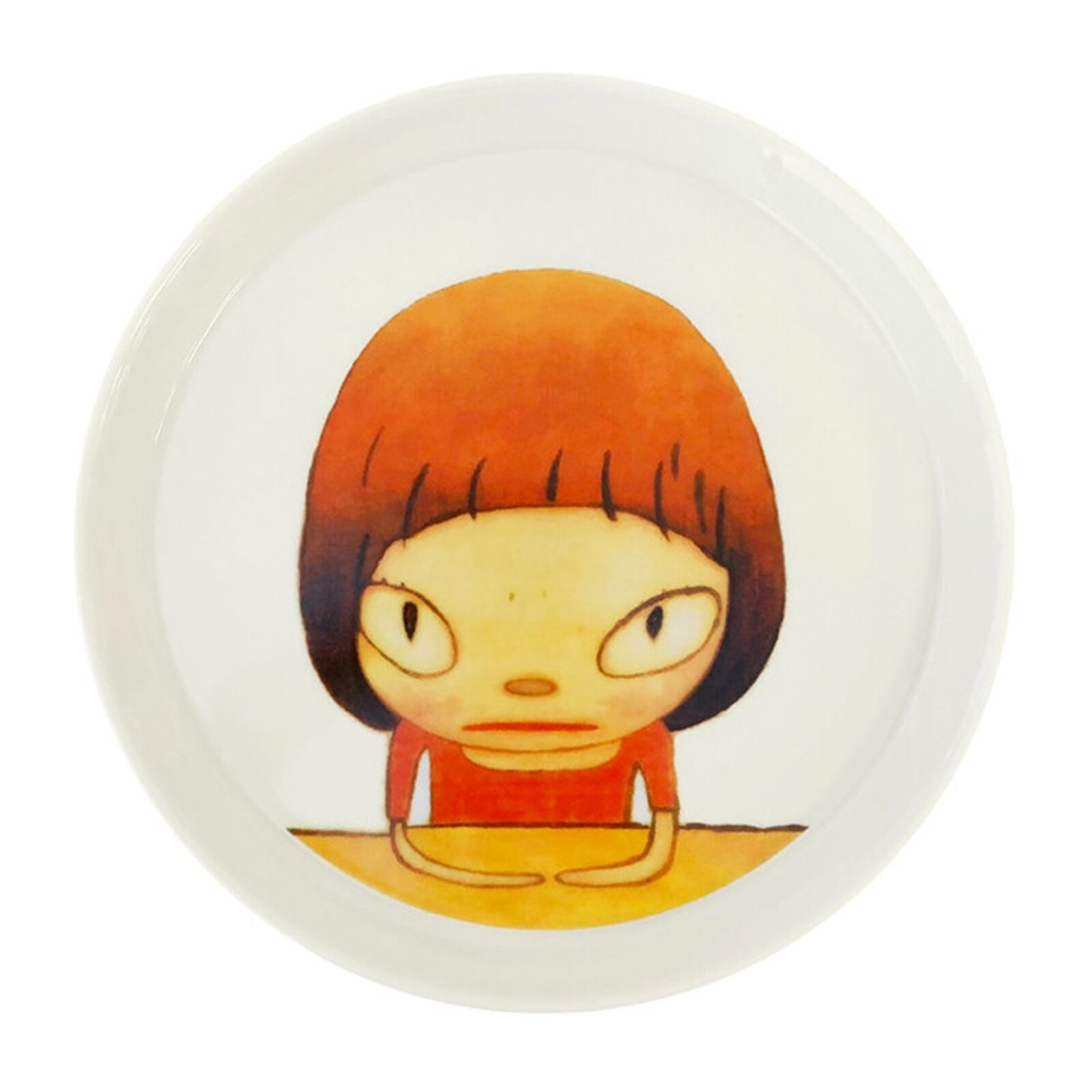 A plate with a drawing of a little girl sitting on the ground.