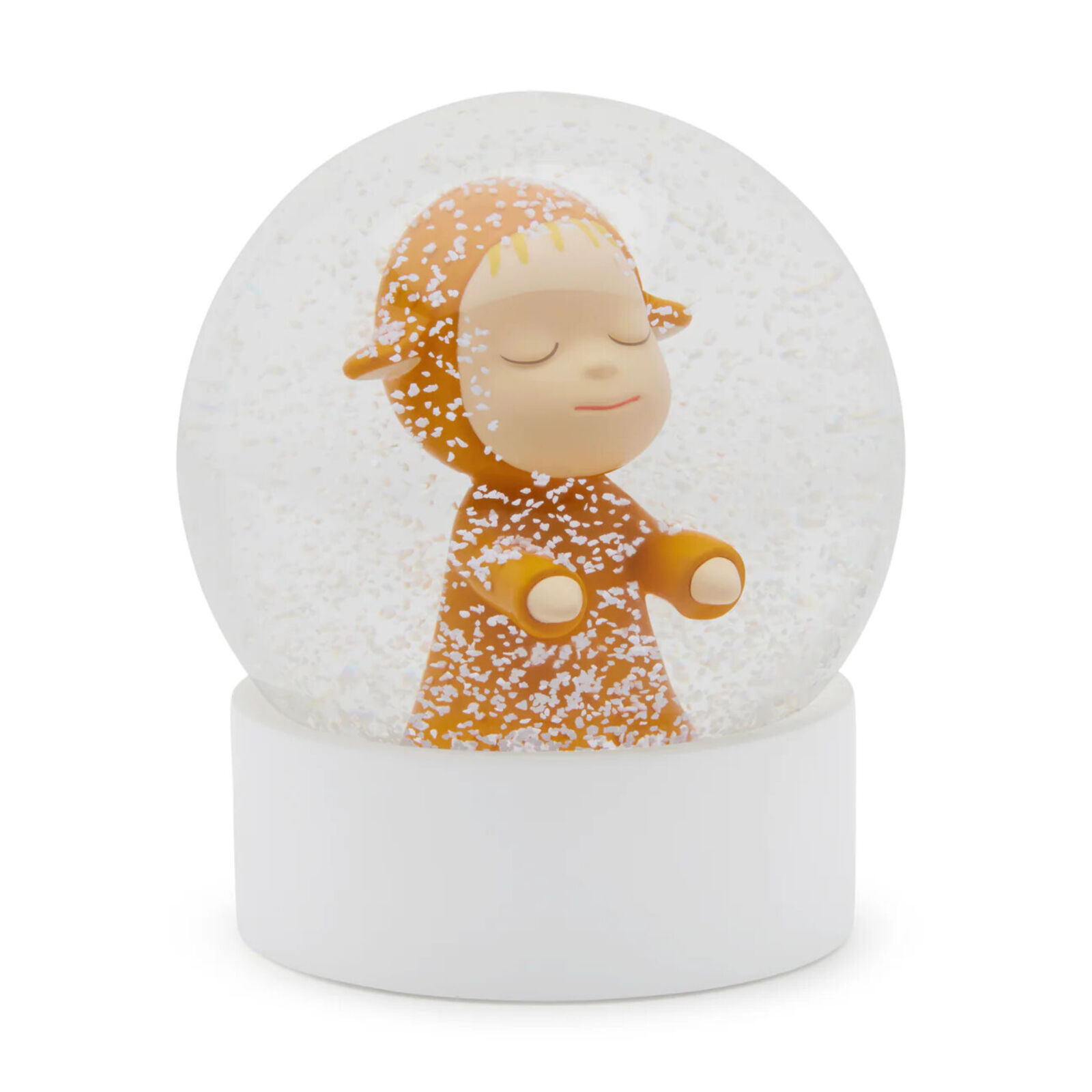 A snow globe with a little girl inside of it.