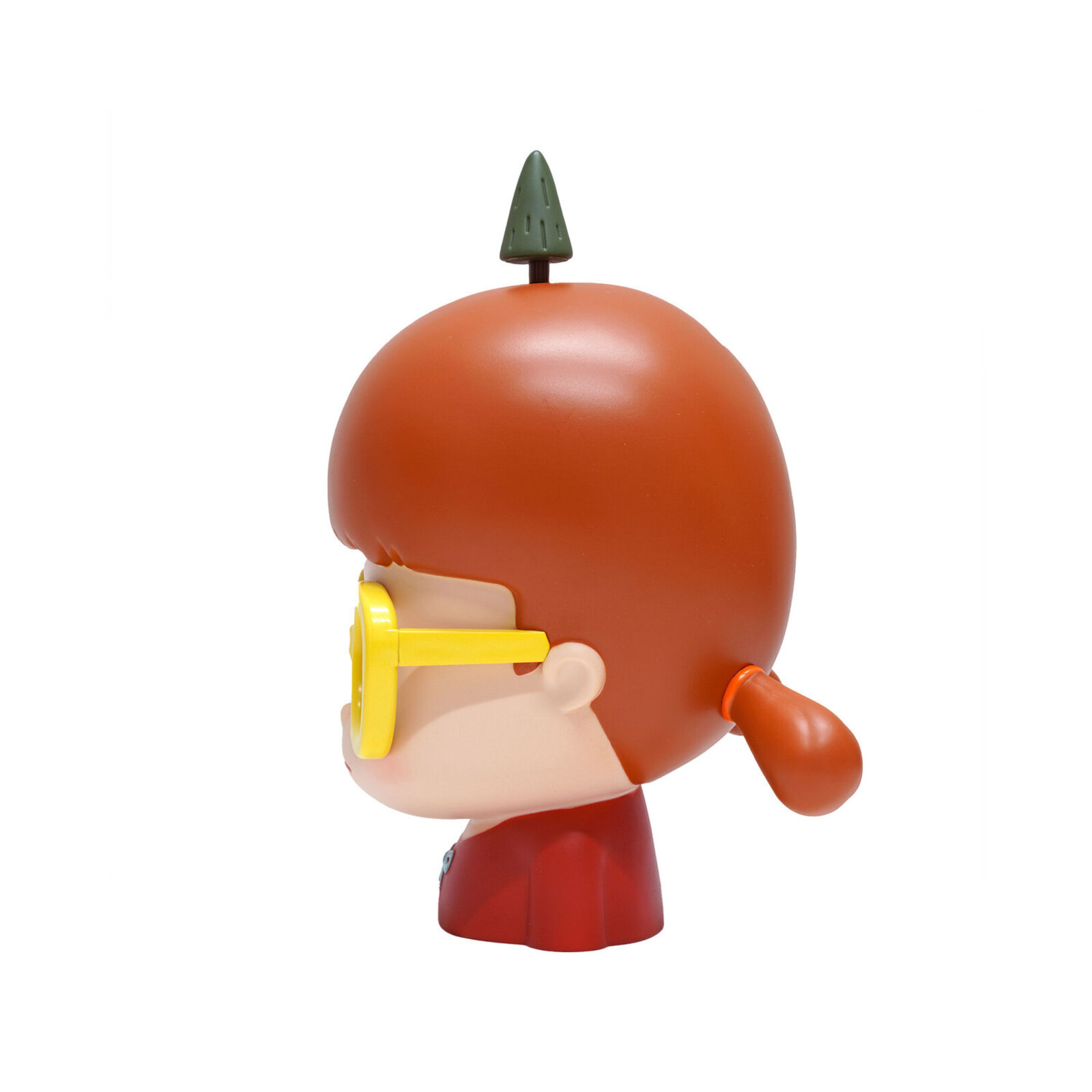 A small figurine of a boy wearing yellow glasses.