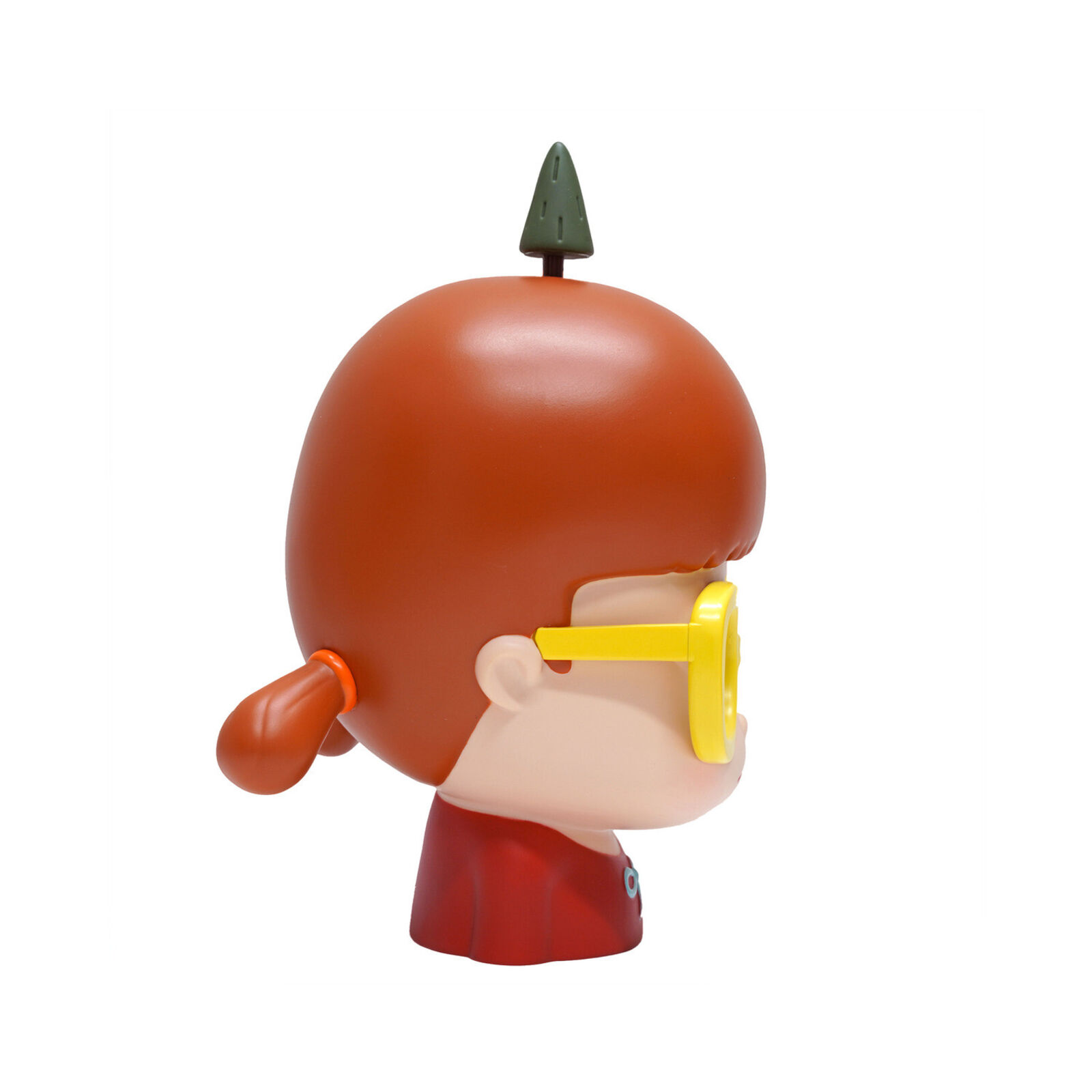 A small figurine of a boy wearing yellow glasses.